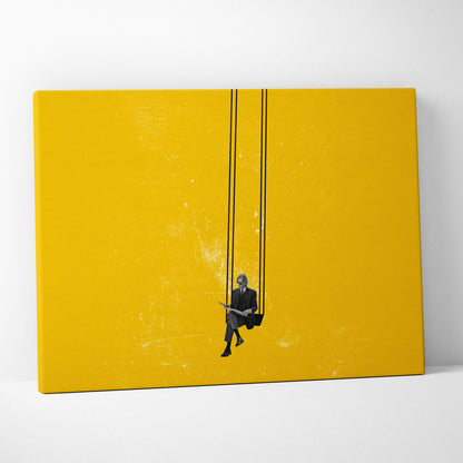 Vibrant yellow canvas wall art featuring a black and white silhouette of a man in a suit on a swing with textured background