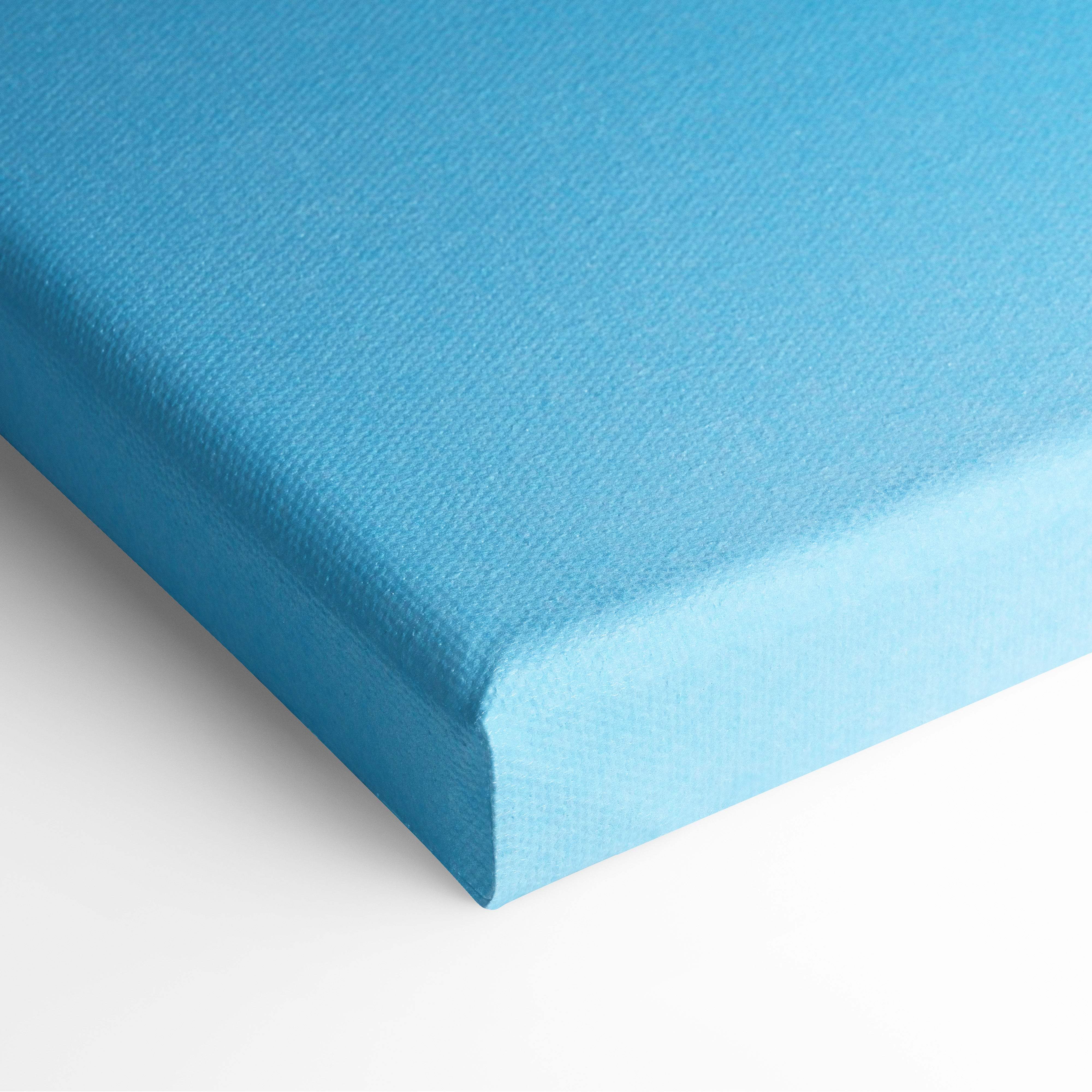 Contemporary floral woman canvas wall art with vibrant blue textured fabric and neatly stitched edges for bedroom decor