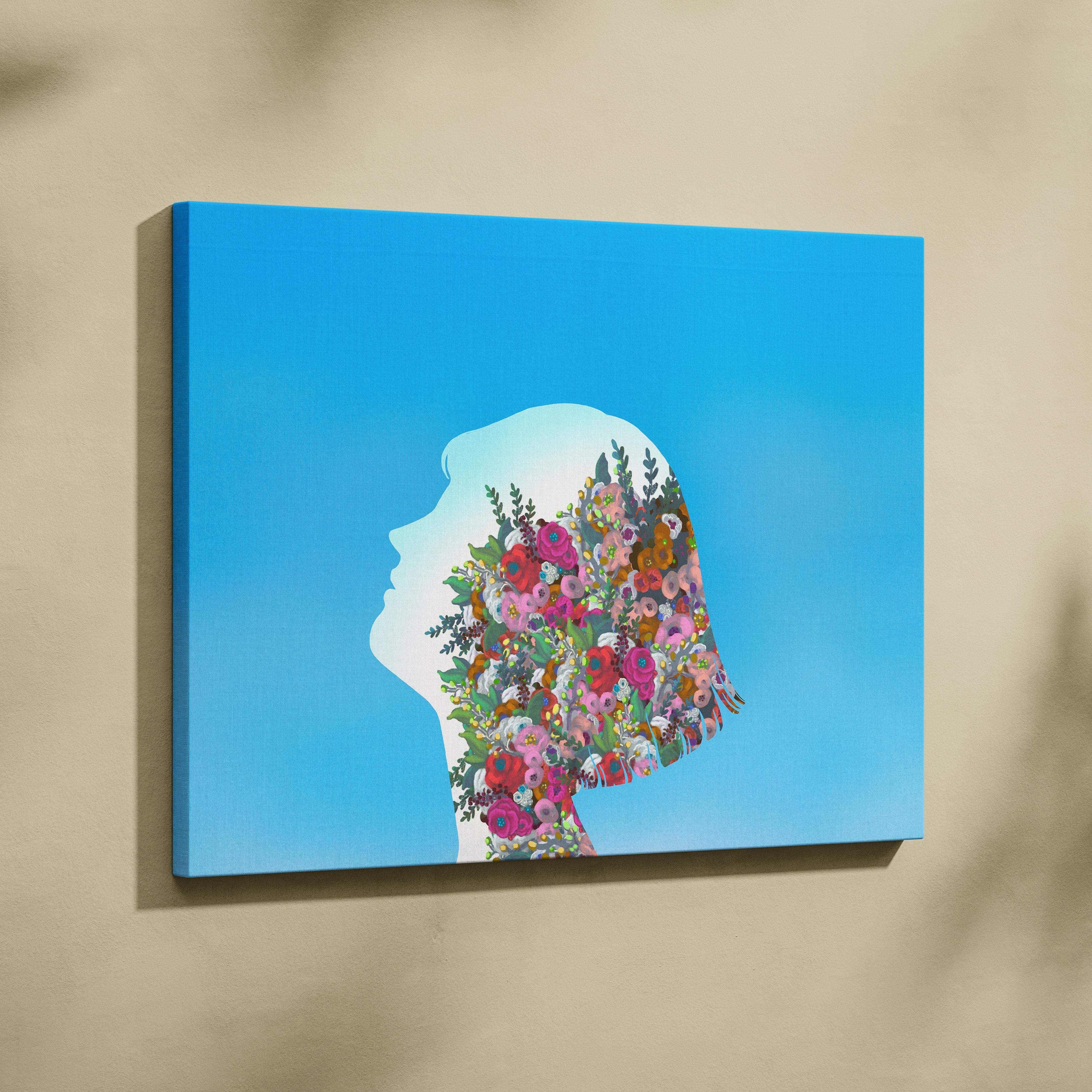 Contemporary floral woman canvas wall art featuring a colorful flower hair silhouette on bright blue background