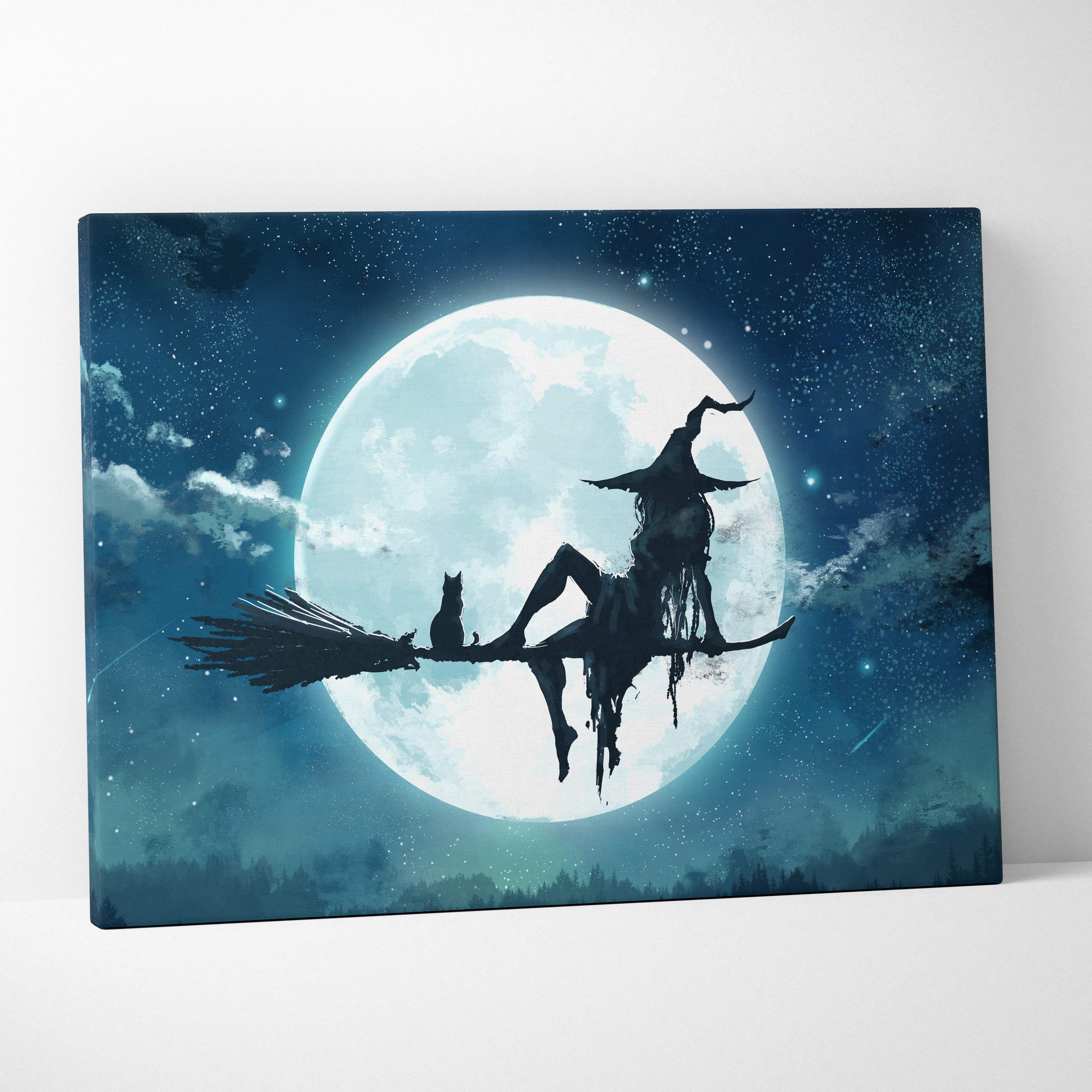 Dark silhouette canvas art of a witch and cat riding a broomstick against a full moon with blue mystic glow