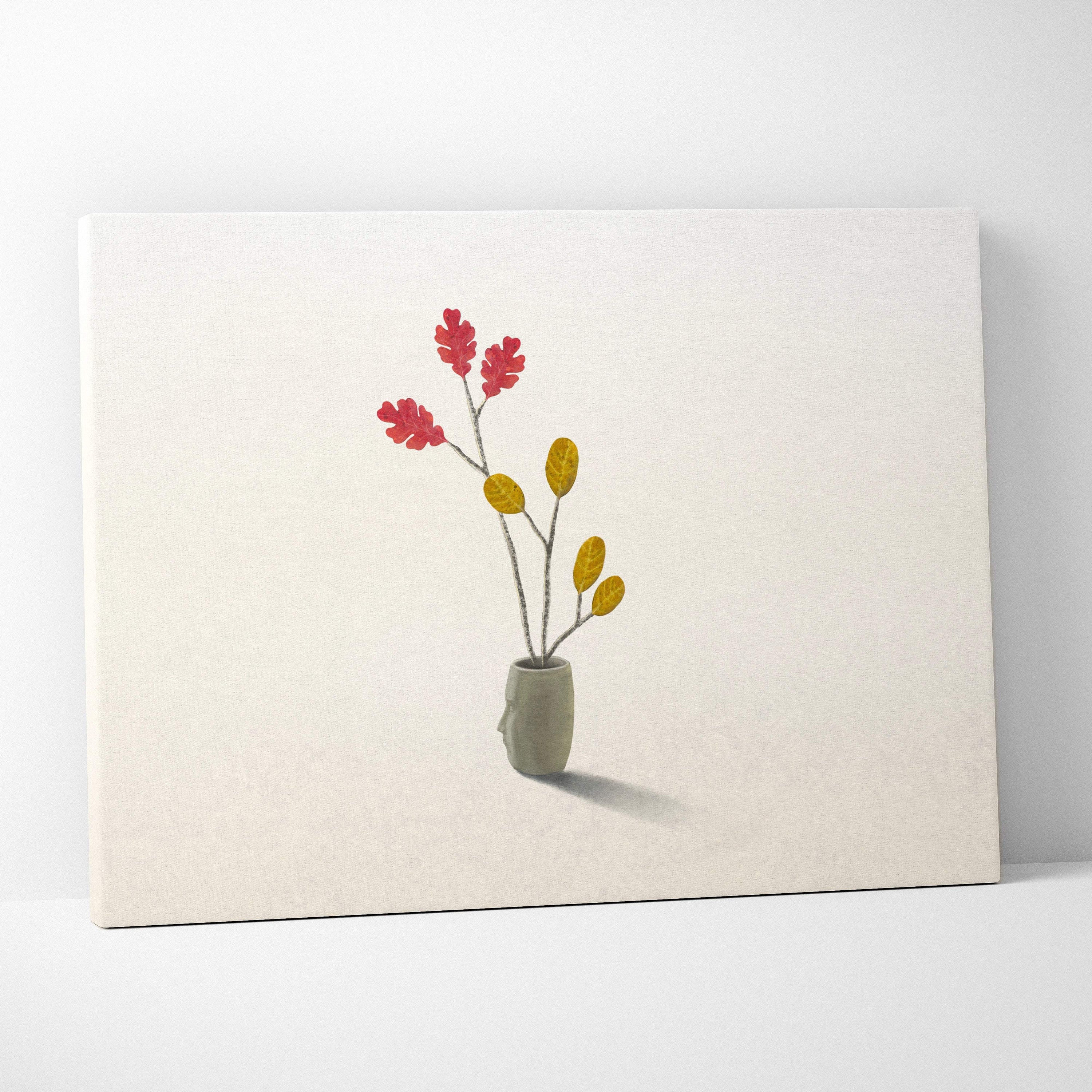 A contemporary minimalist canvas print of a gray ceramic vase with red and yellow leaf branches for bedroom decor