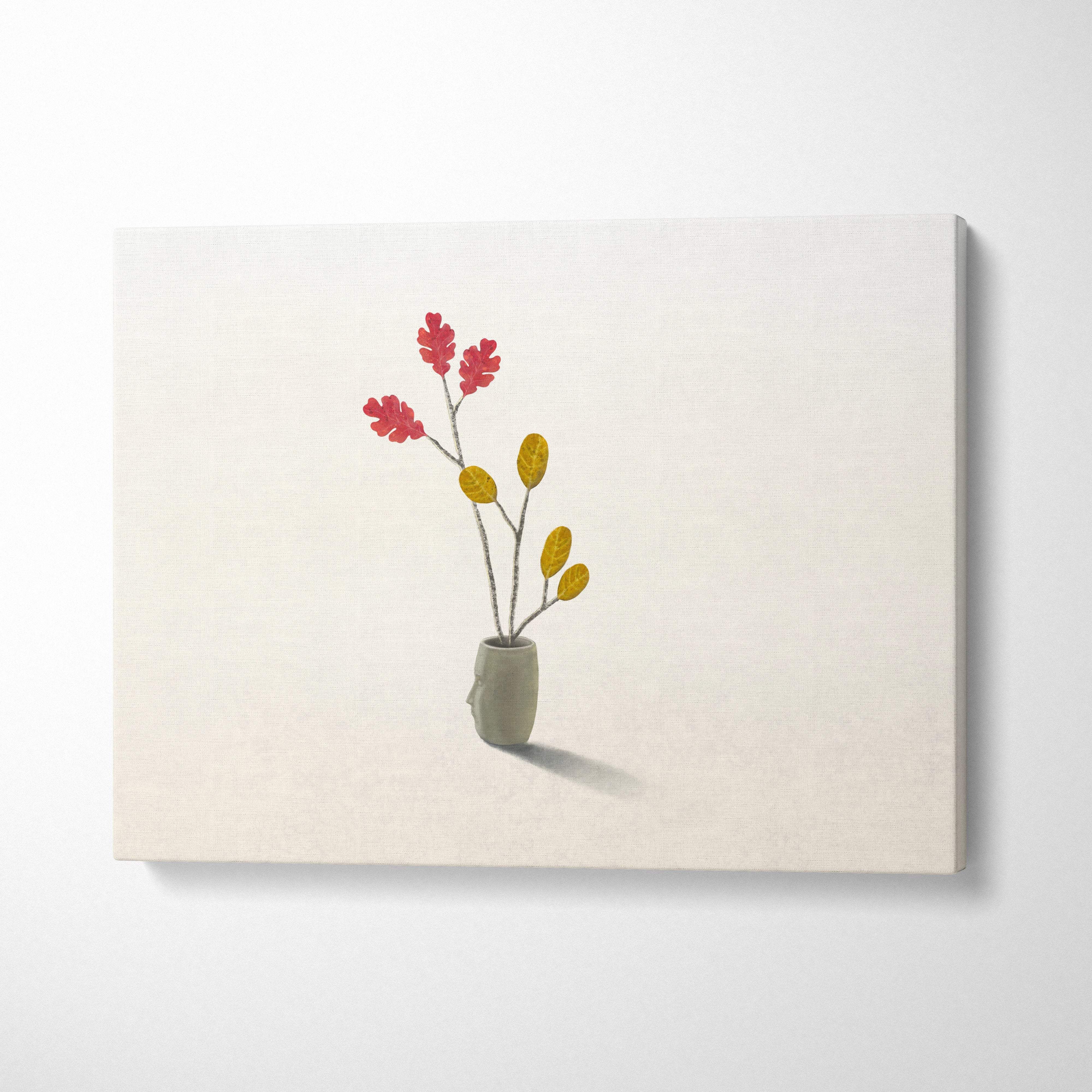 Contemporary minimalist canvas print featuring a gray ceramic vase with red and yellow leaf branch for bedroom decor