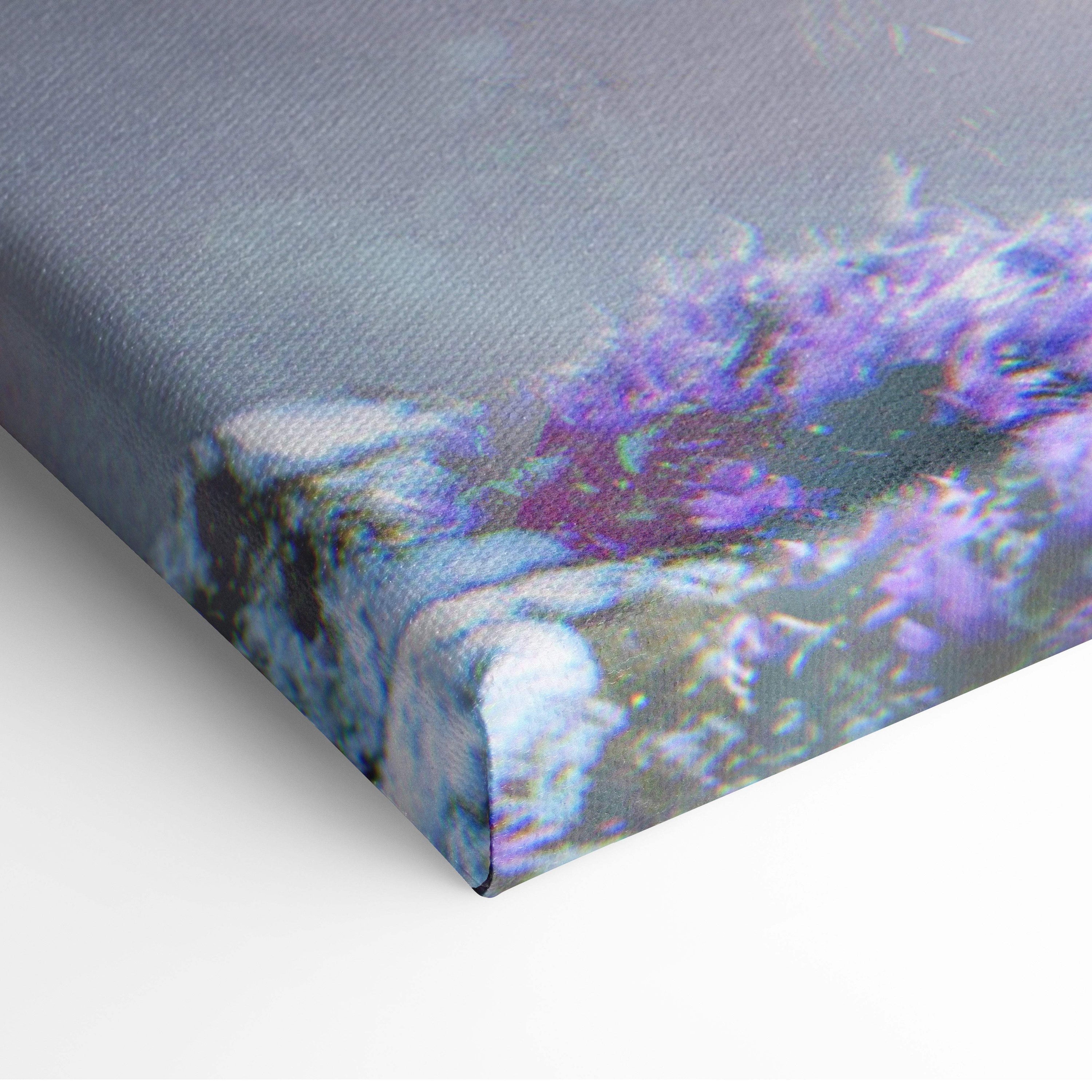 A stretched canvas print with a vibrant purple and blue abstract floral design for gaming room decor