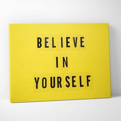 Bright yellow canvas wall art with believe in yourself bold black typography for motivational home or office decor