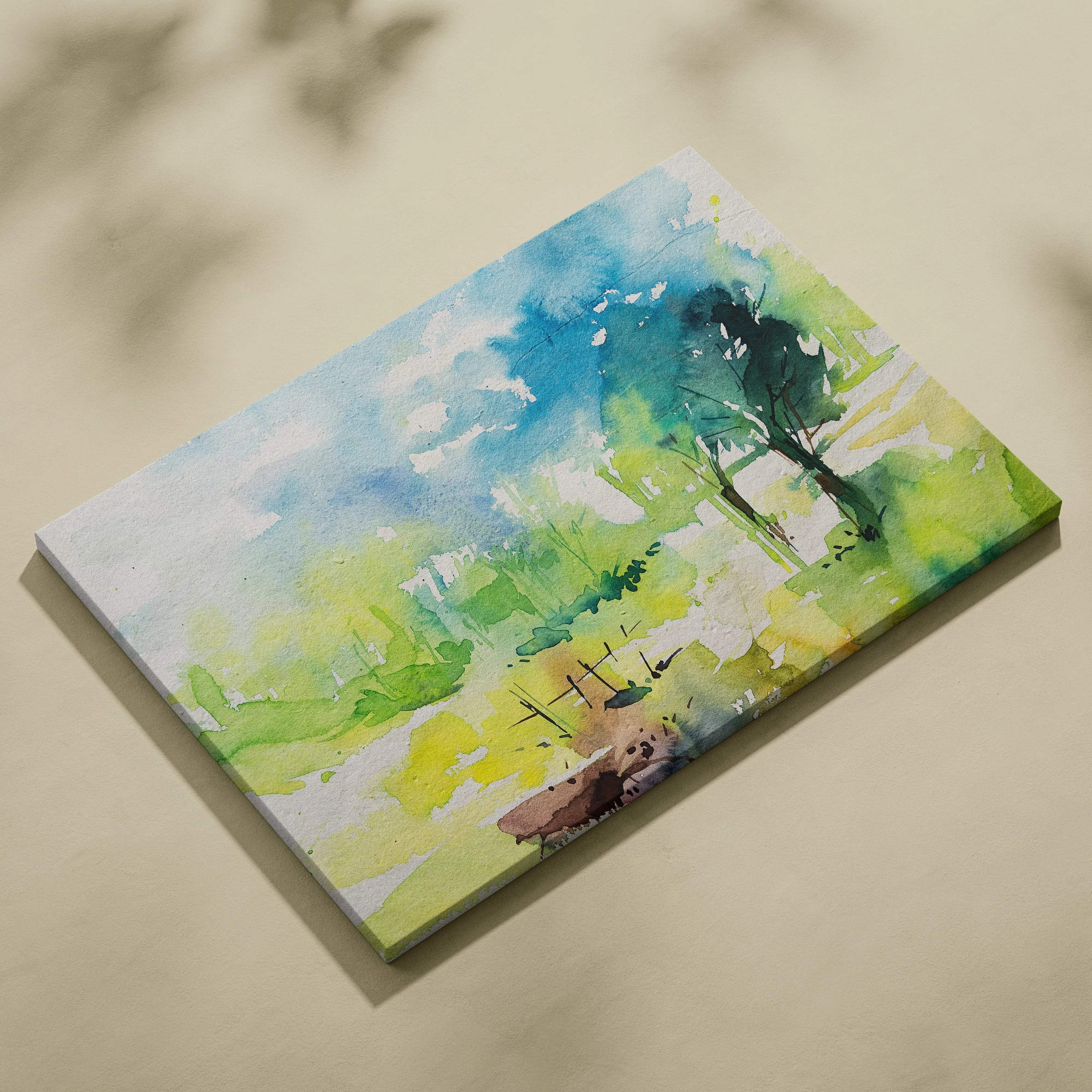 Pastel watercolor landscape canvas wall art in blended blues greens yellows with abstract tree silhouettes and loose brush strokes