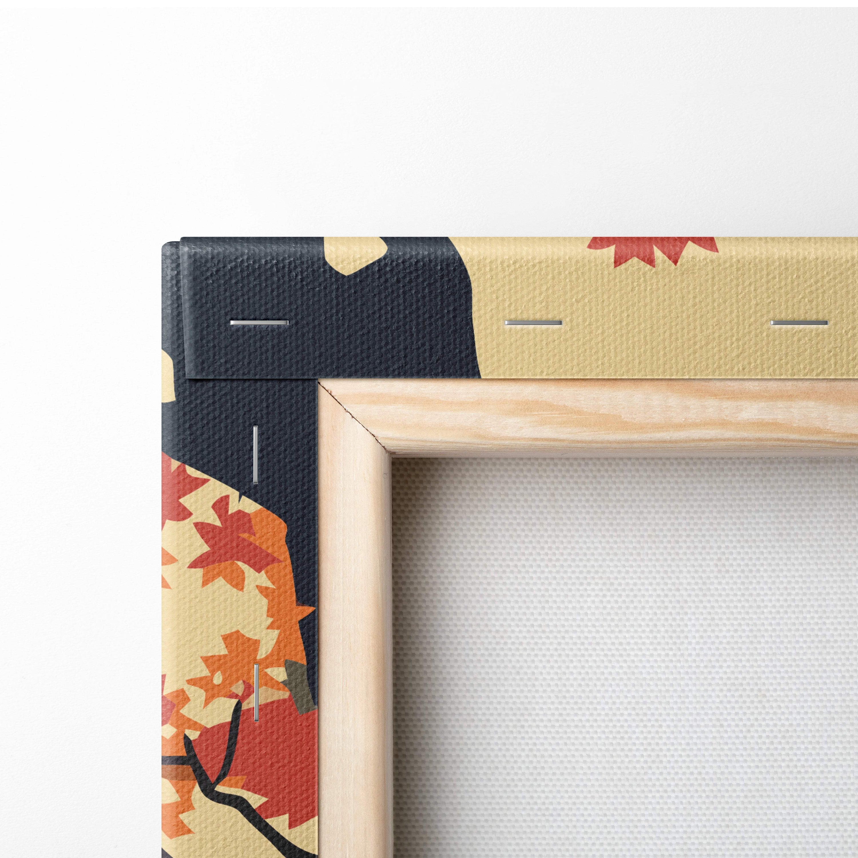 A wooden canvas frame with a black and beige autumn leaf border on japanese pagoda autumn wall art