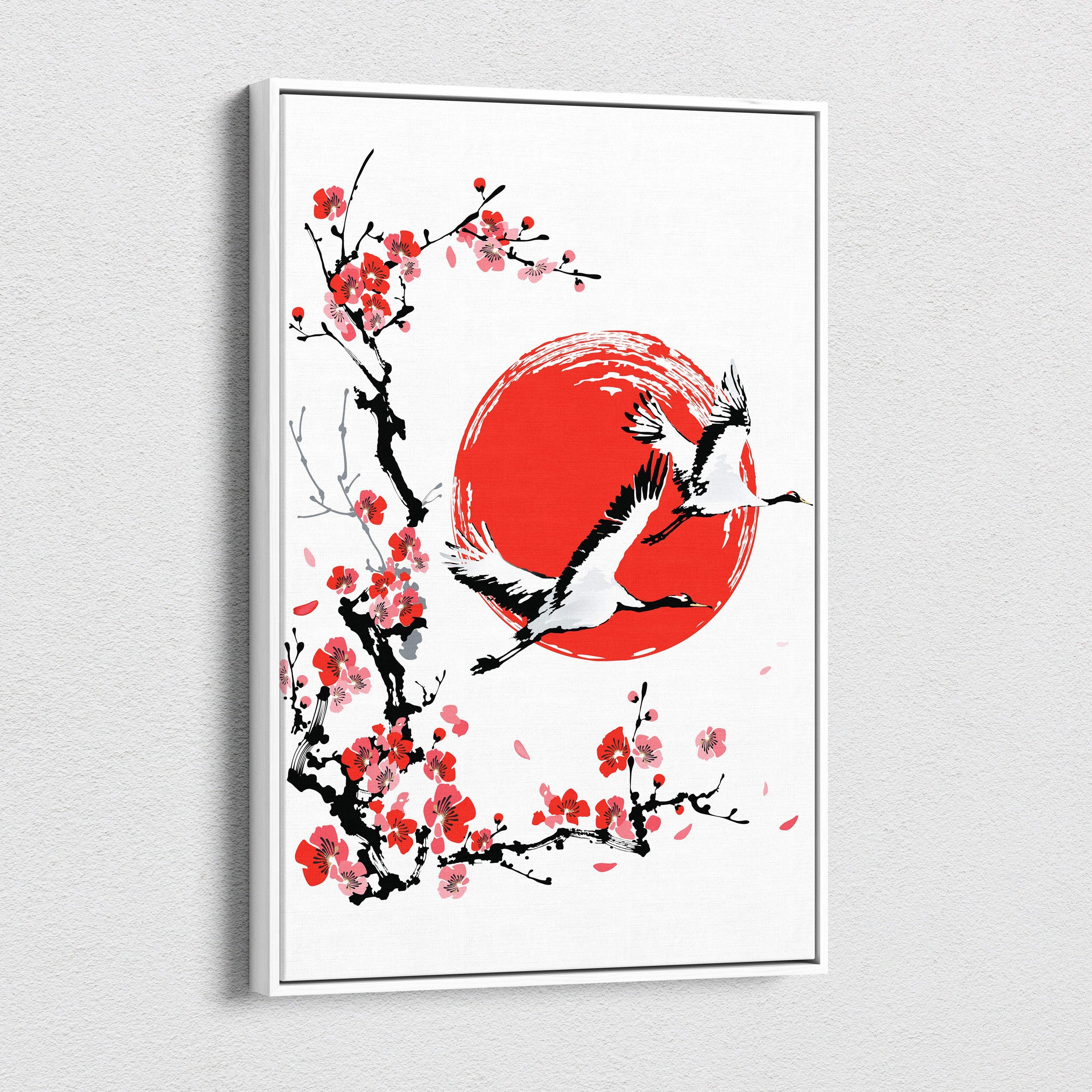A framed canvas print of red sun crane cherry blossom wall art in japanese ink painting style for living room decor