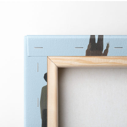 Light wood-framed canvas art with light blue textured surface and dark silhouette design for modern office decor