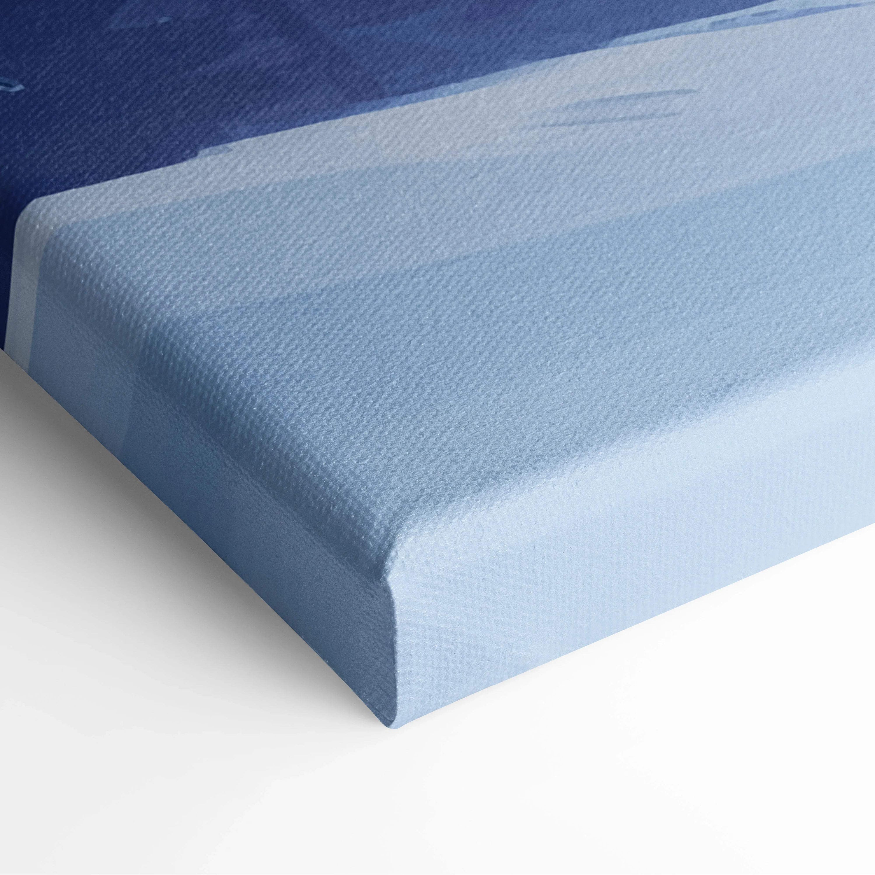 Back of snowy mountain aurora canvas art on blue gradient textured stretcher bars
