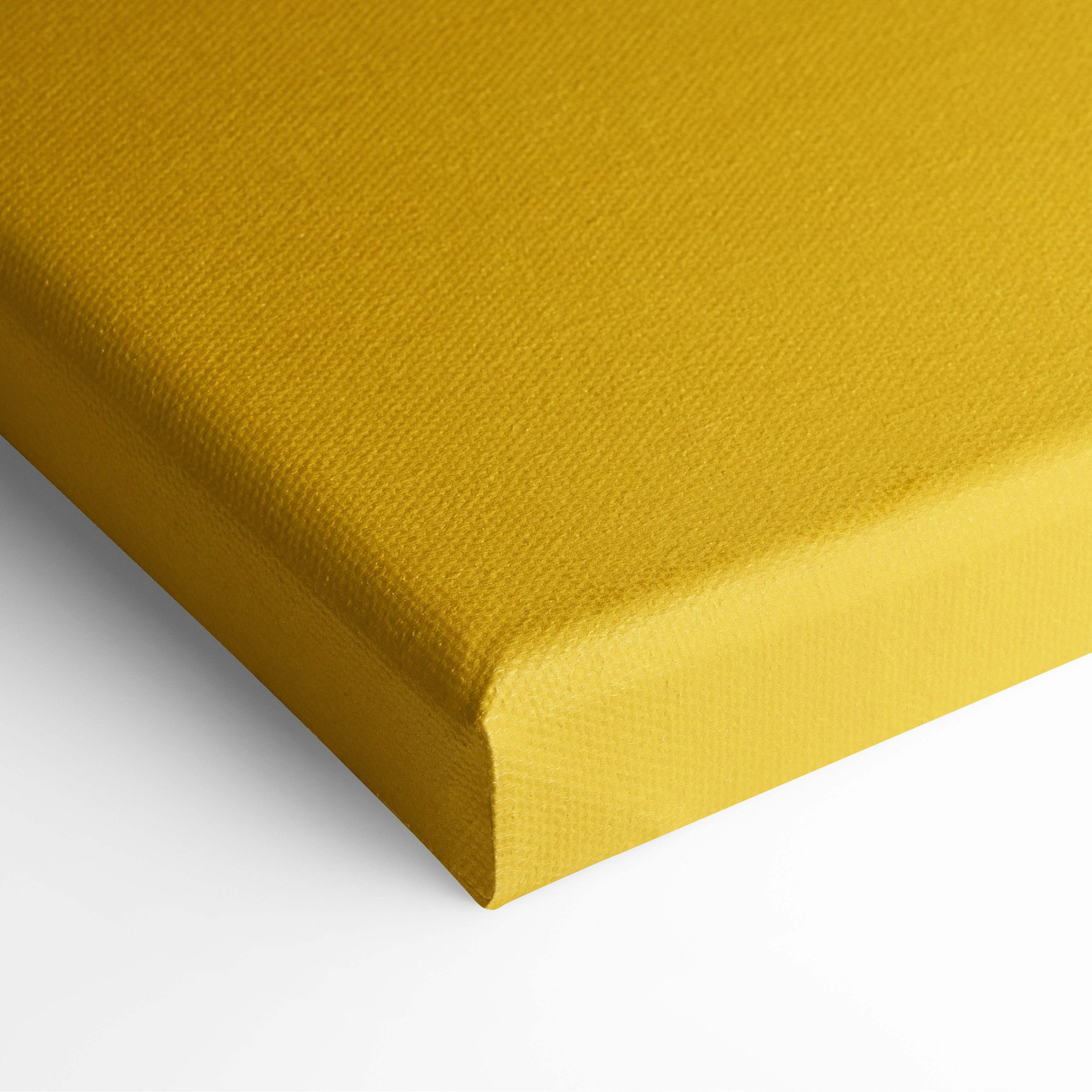 A mustard yellow canvas with textured woven surface in fight your limit motivational wall art print for gym or office decor
