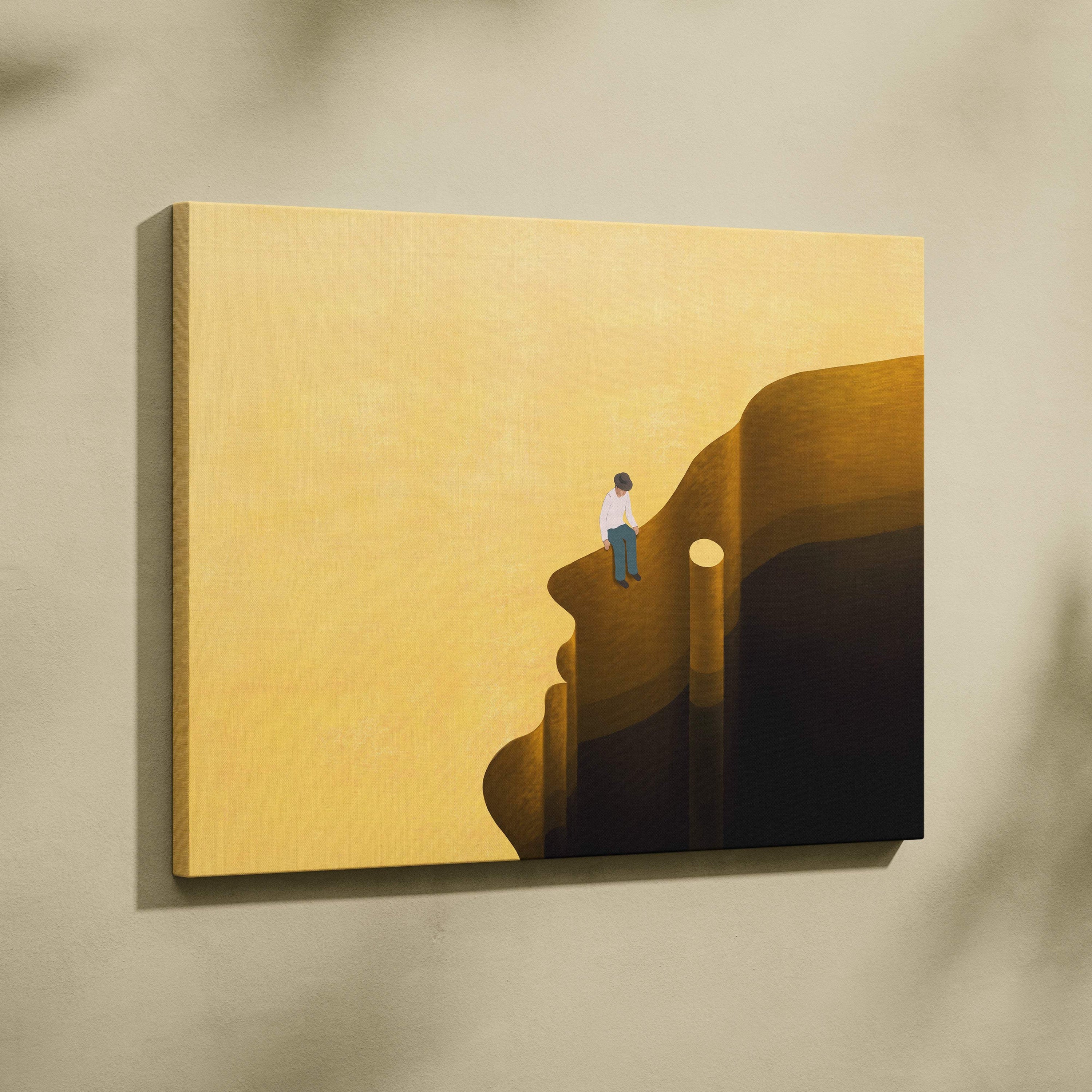 Contemporary man on head canvas wall art featuring a minimalist solitary figure on a golden-yellow cliffside landscape