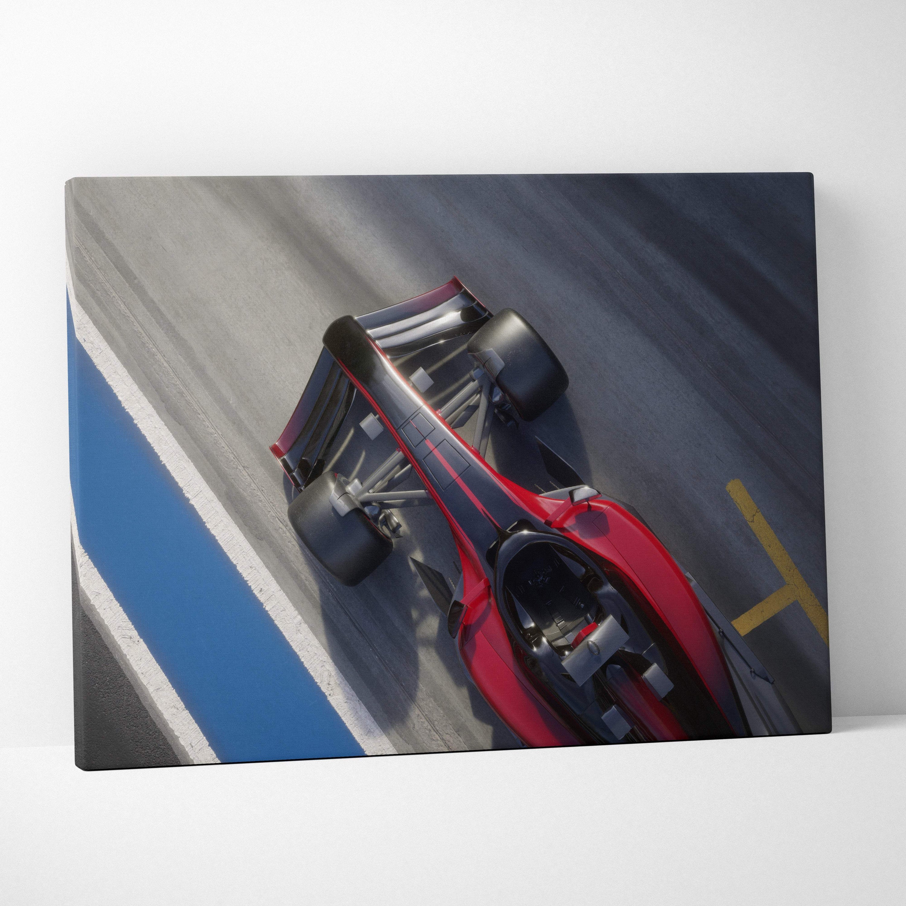 Red and black formula 1 race car canvas wall art print featuring overhead motorsport track photography style decor