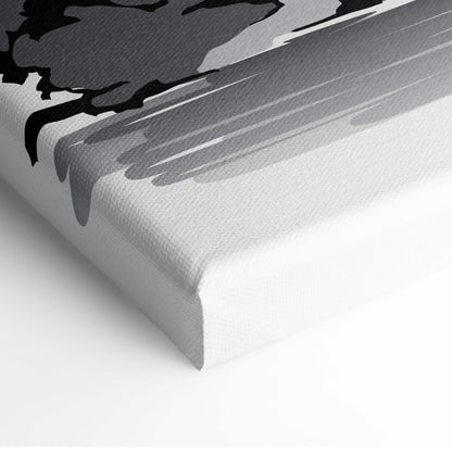 A modern abstract canvas print with bold black and gray brushstrokes on textured white fabric for zen decor