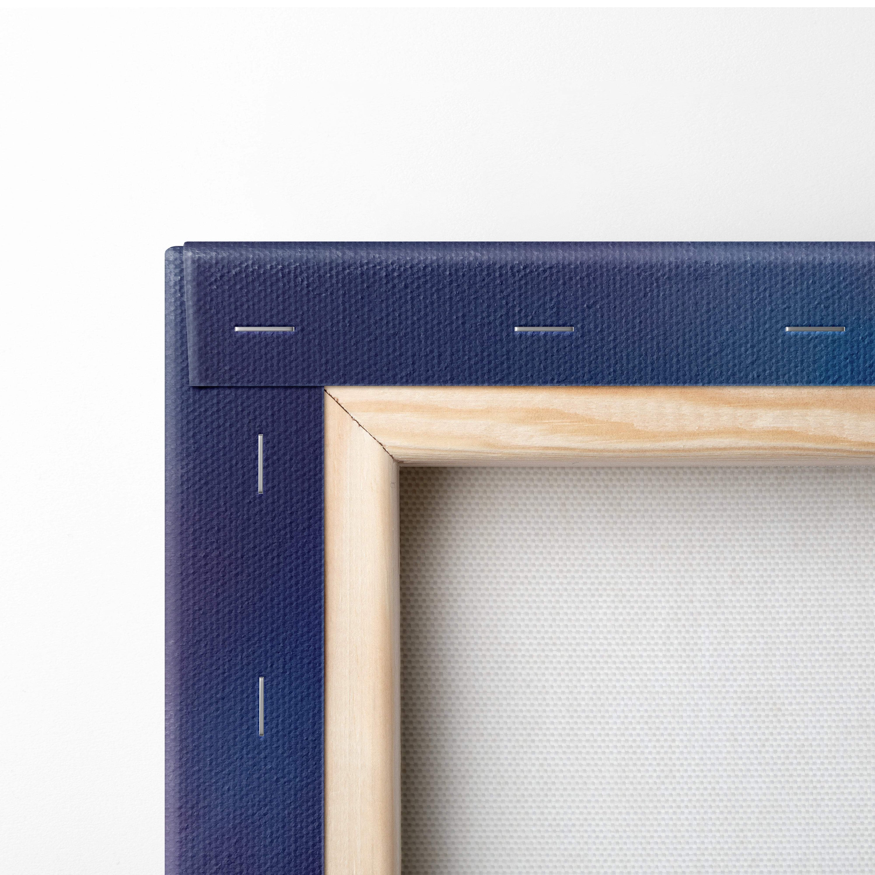 Navy blue canvas art with visible stitching and light wood frame for dreamy colorful sky abstract wall decor