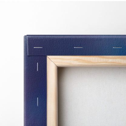 Navy blue canvas art with visible stitching and light wood frame for dreamy colorful sky abstract wall decor