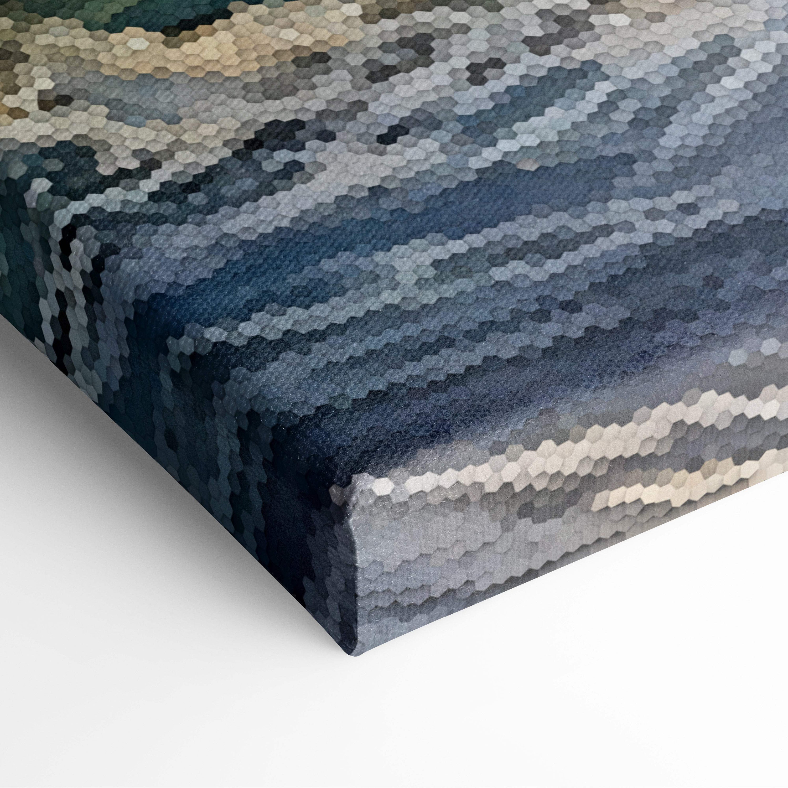 A textured canvas print of an abstract pixelated ocean wave in blue gray and beige for coastal living room decor