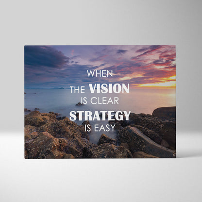 Rectangular canvas print featuring a serene sunset over rocky shoreline with motivational leadership quote for office decor