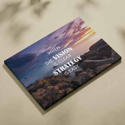 A rectangular canvas print with a vibrant sunset and white motivational text for office or home decor