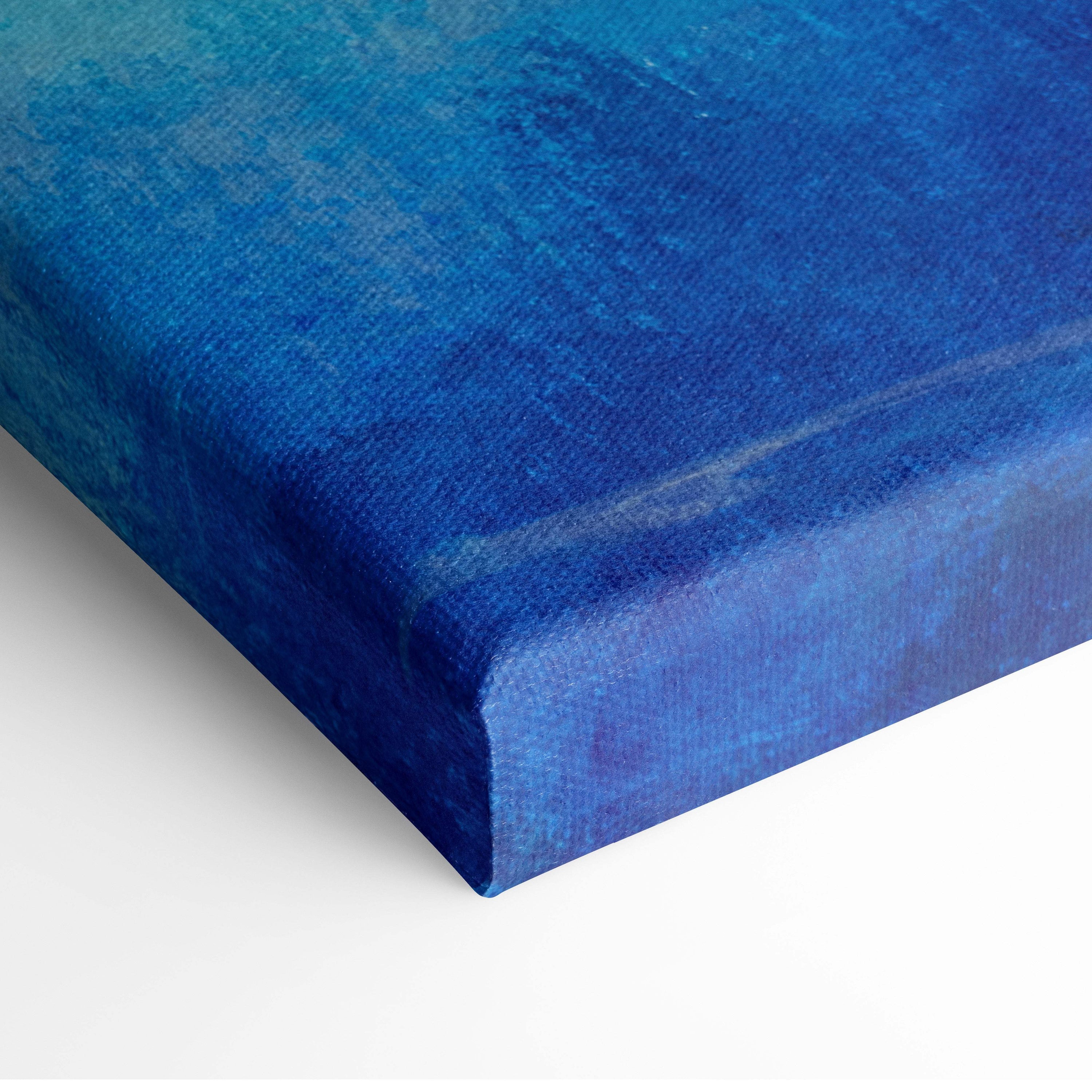 A textured canvas print of radiant sunrise lake painting with golden sunburst over reflective water and blue gradient hues