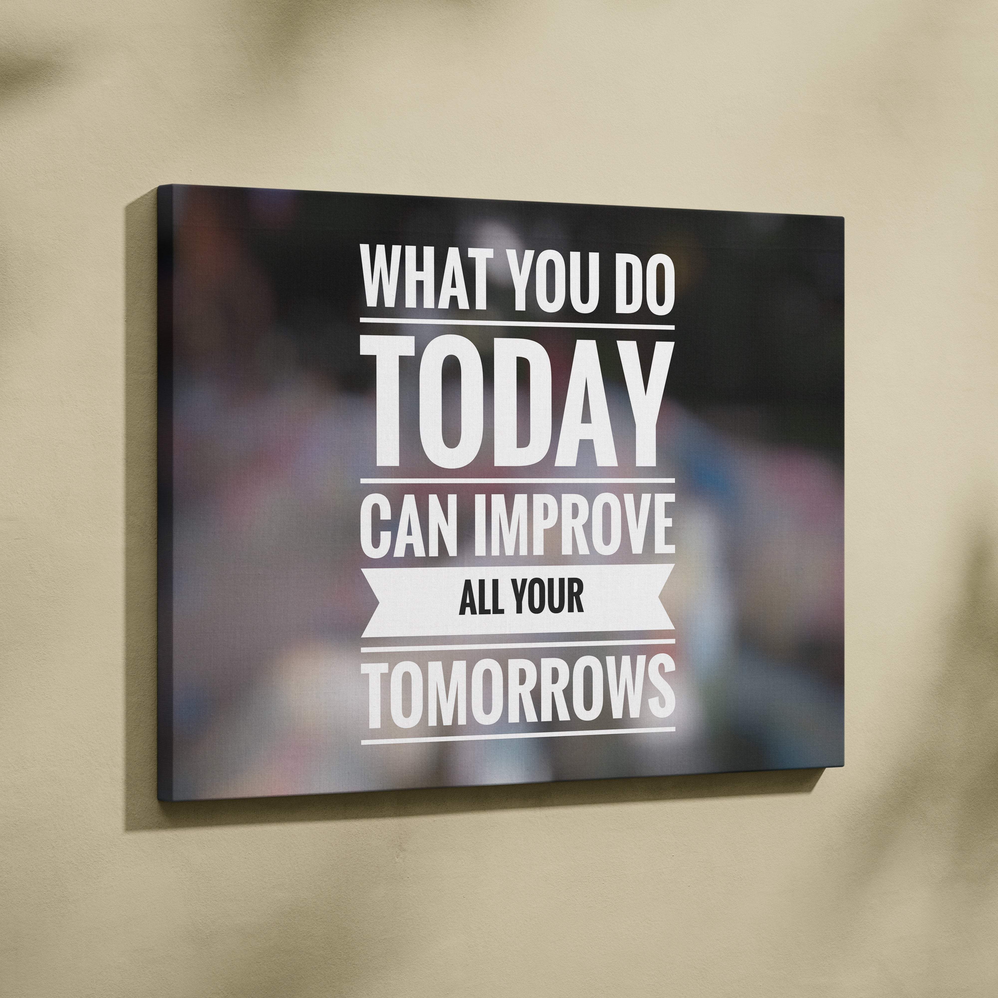 Black canvas print wall art featuring a motivational quote in bold white lettering with a ribbon banner design