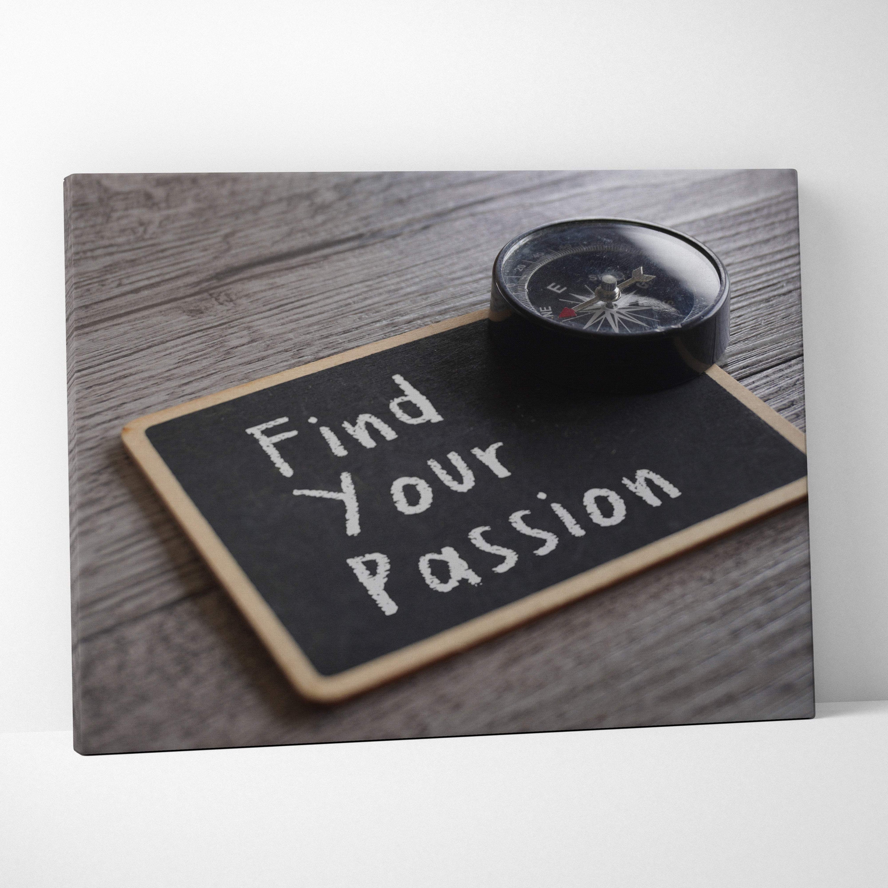 Black rectangular chalkboard canvas wall art print with white find your passion text and small compass for office decor