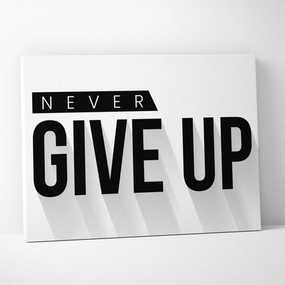 White canvas print with bold black never give up text in modern font motivational wall art for office gym or home decor