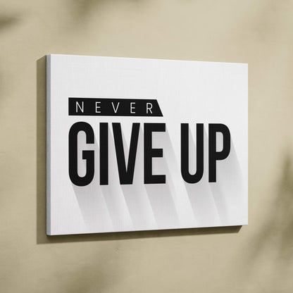 White canvas wall art with bold black never give up text in modern sans serif font for motivational decor