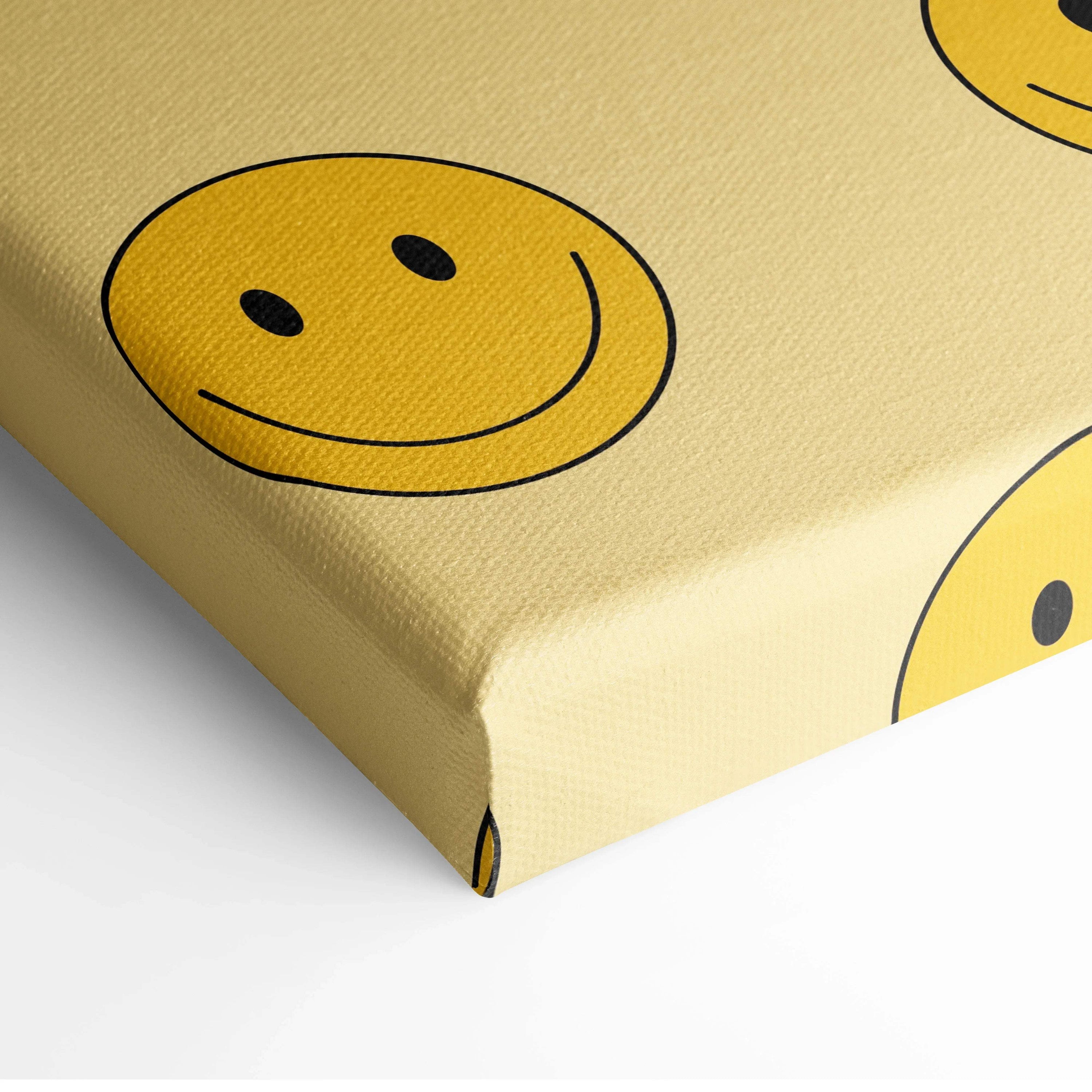 Yellow canvas print with black-outlined smiley faces pattern on beige background