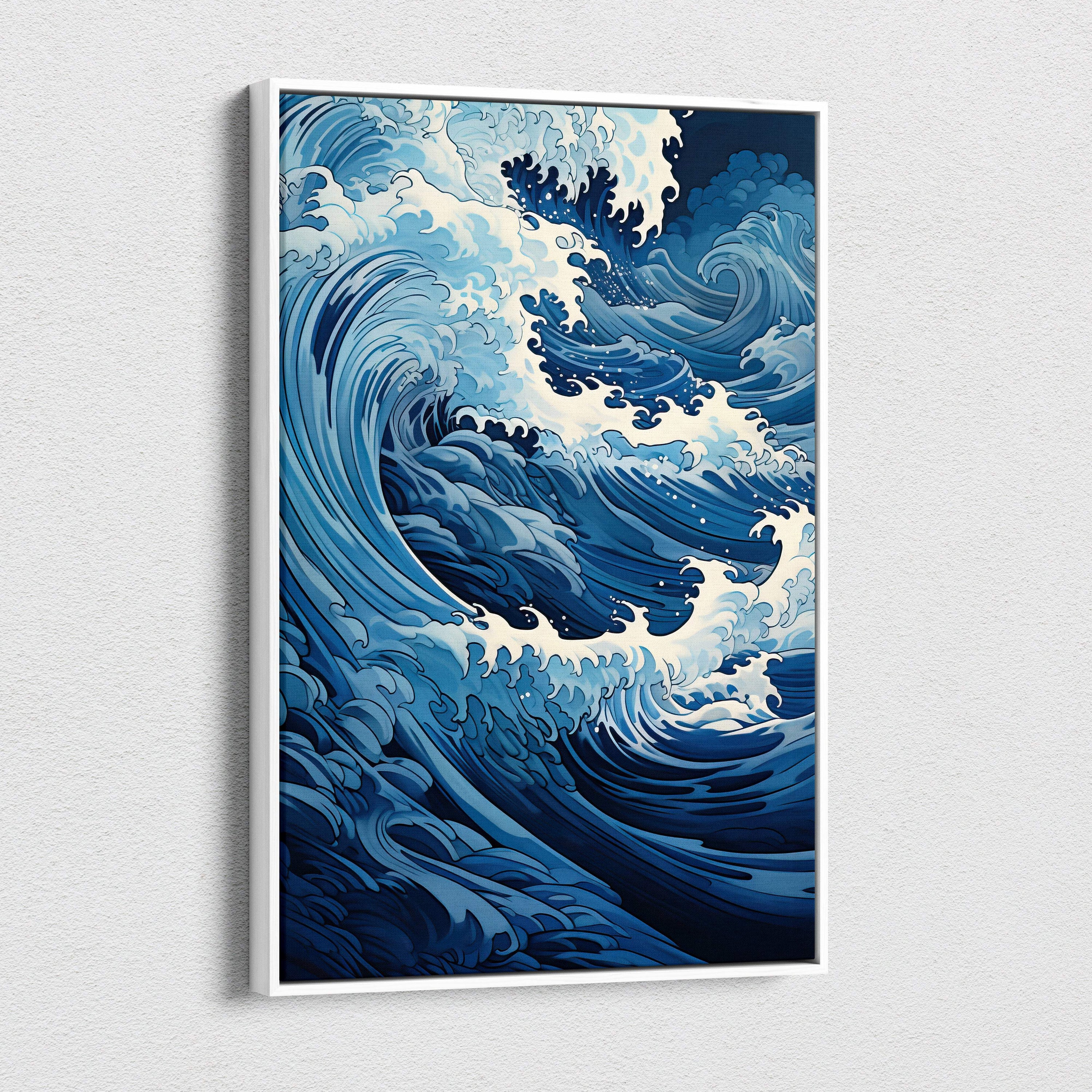 A framed blue japanese wave canvas wall art featuring a bold stylized ocean wave in white and blue shades