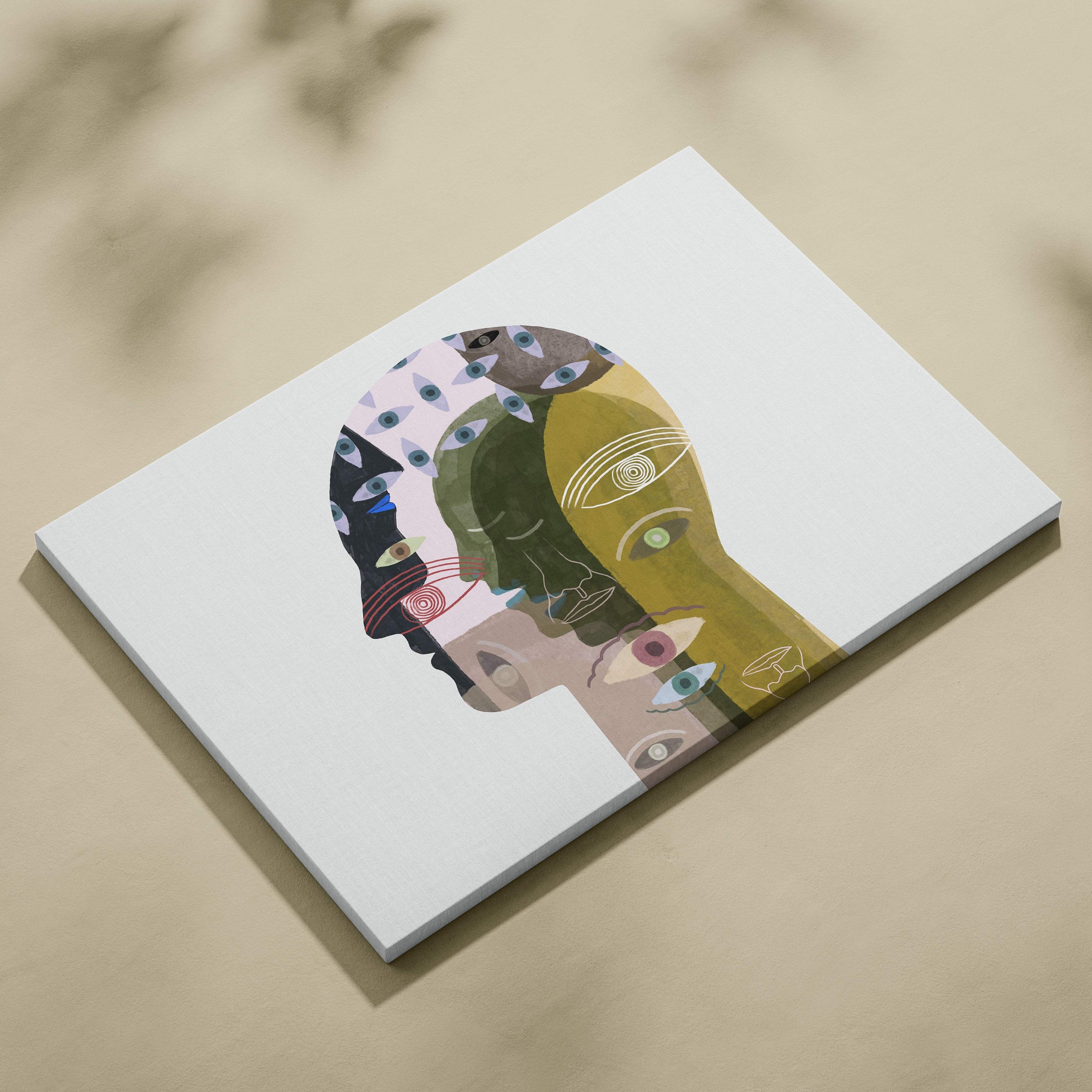 White canvas print of contemporary abstract face wall art with overlapping earthy and vibrant colors and eye patterns
