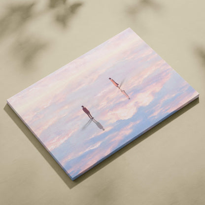 Contemporary rectangular canvas print of pastel pink and blue dreamscape with two silhouetted figures on clouds