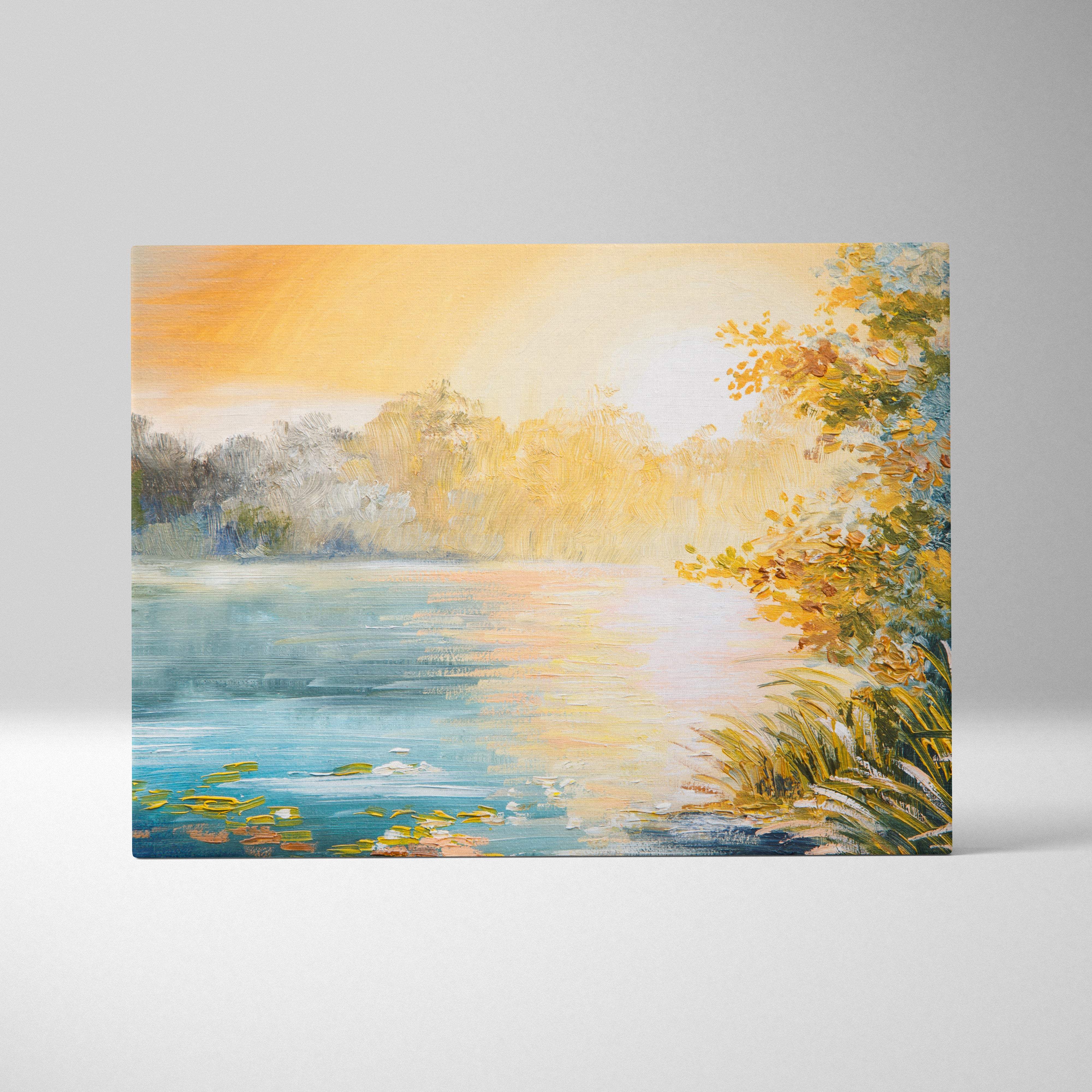 Soft blue lake sunrise canvas wall art print showing a serene lakeside sunset with warm orange and yellow reflections