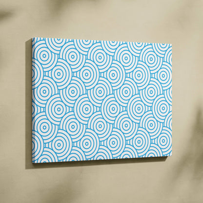 Modern blue concentric circles pattern on white canvas wall art