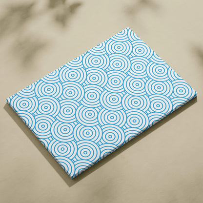 Modern blue concentric circles pattern on white canvas wall art