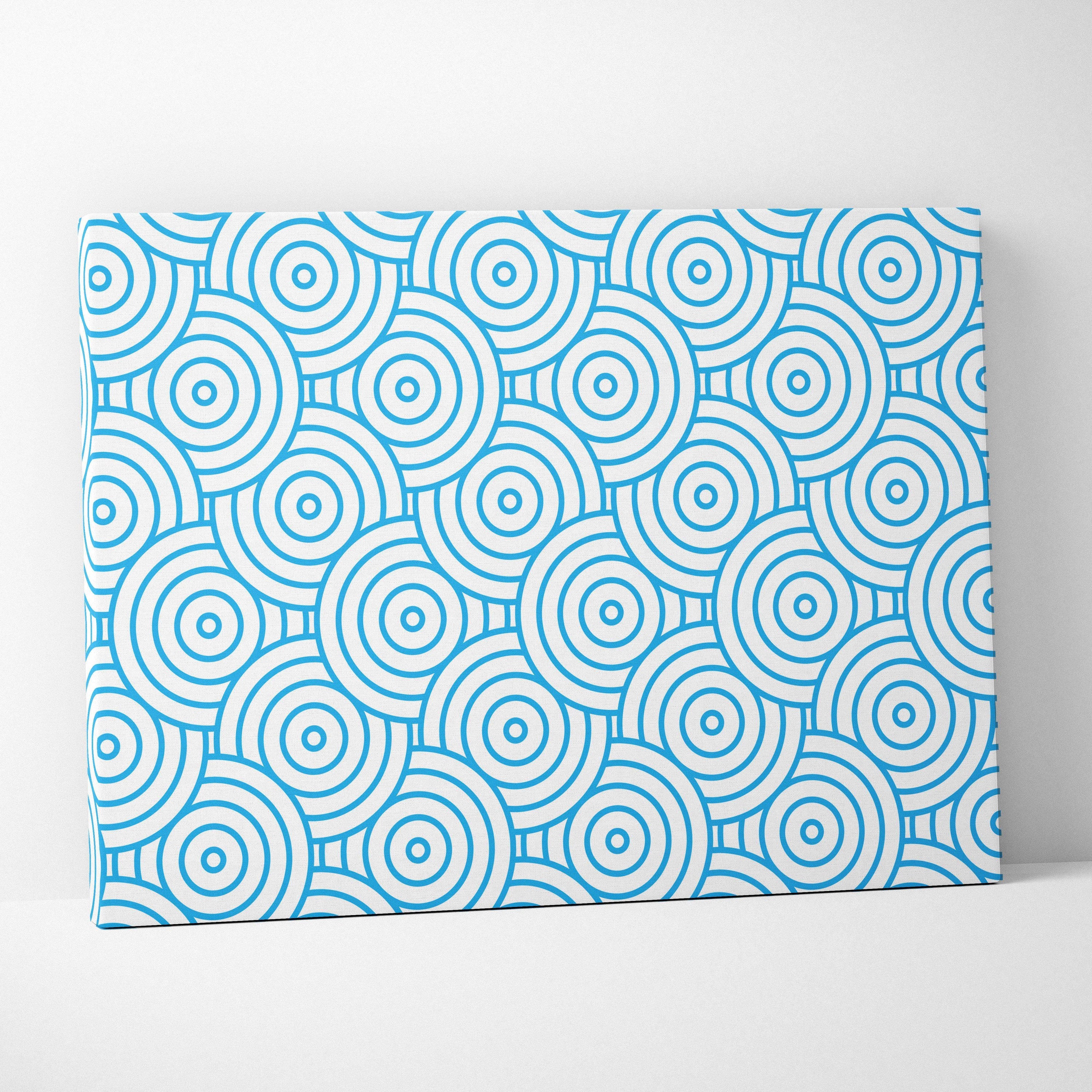 Modern blue concentric circles pattern on white canvas wall art