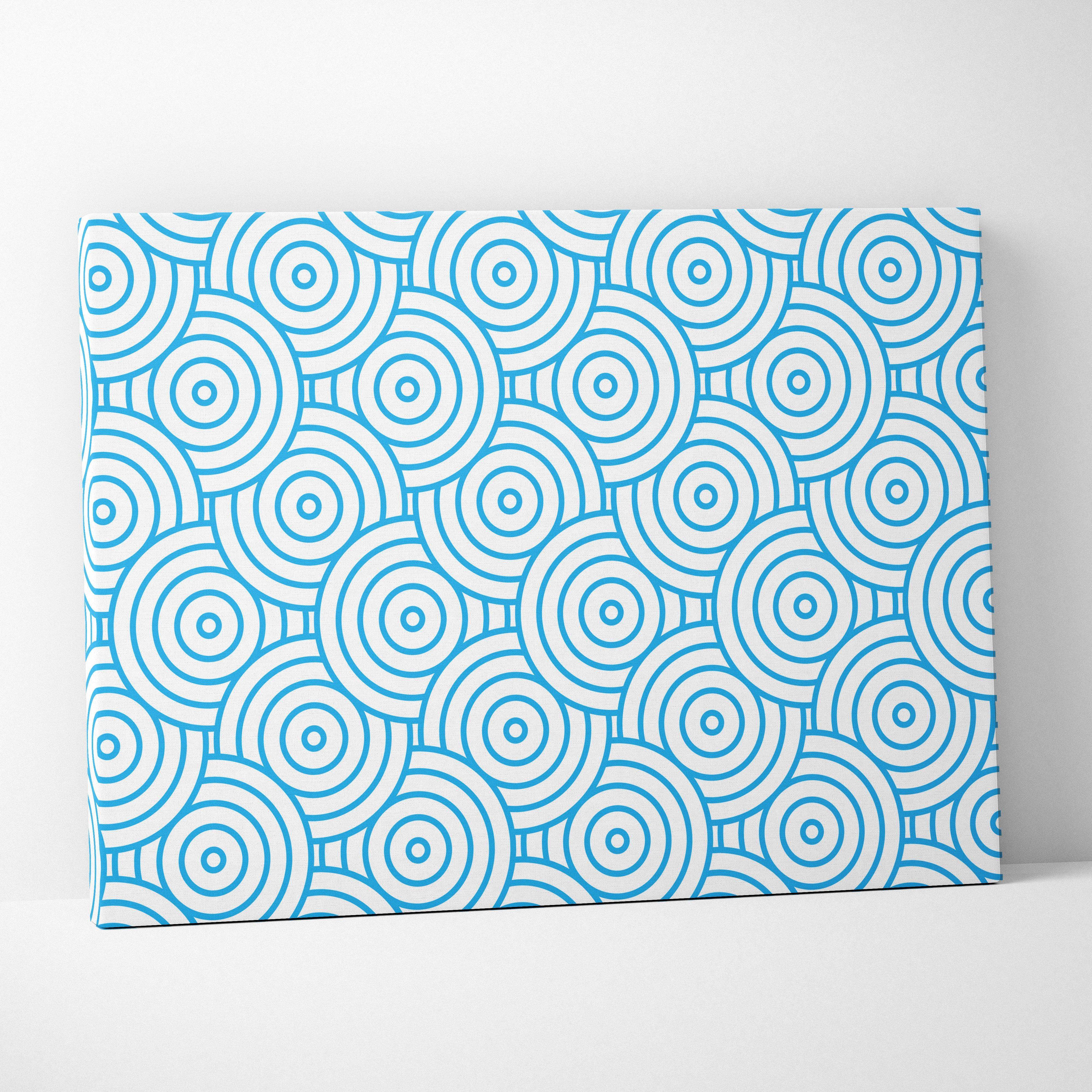 Modern blue concentric circles pattern on white canvas wall art