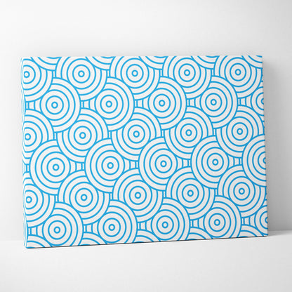Modern blue concentric circles pattern on white canvas wall art