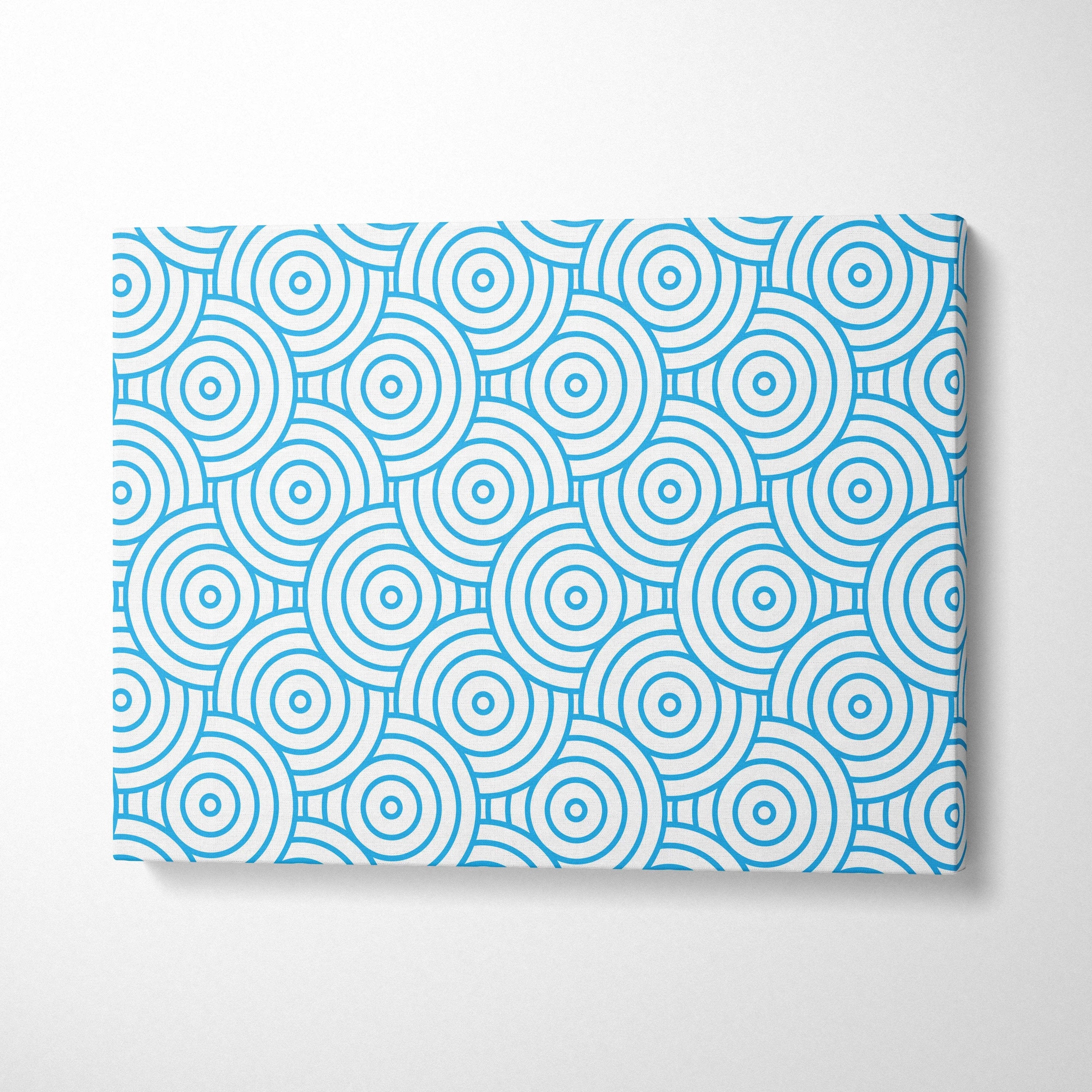 Modern blue concentric circles pattern on white canvas wall art