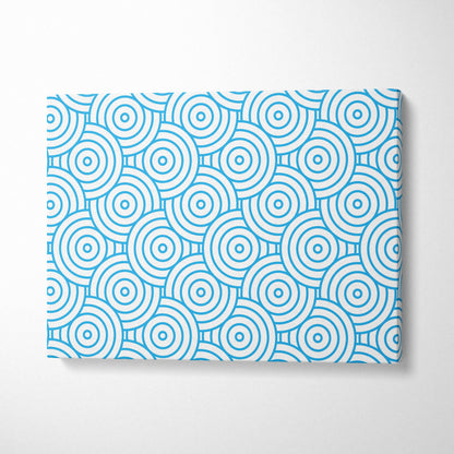 Modern blue concentric circles pattern on white canvas wall art