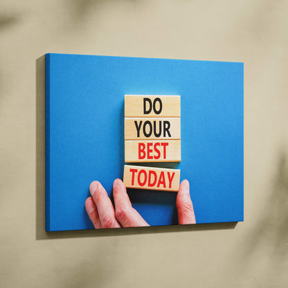 Blue canvas print featuring stacked wooden blocks with do your best today phrase in black and red lettering motivational wall art