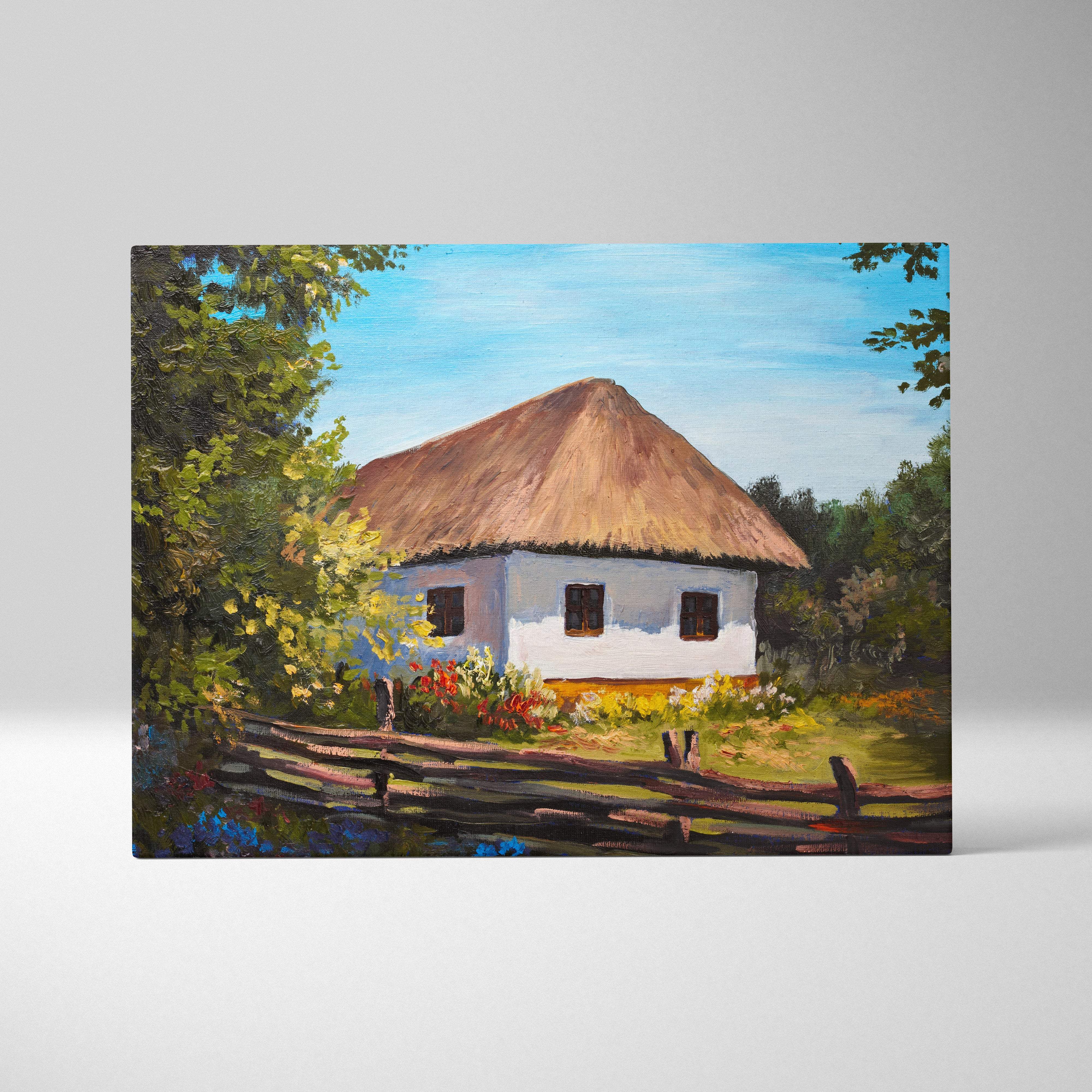 Rustic white cottage canvas wall art print featuring a thatched roof cottage surrounded by greenery and flowers