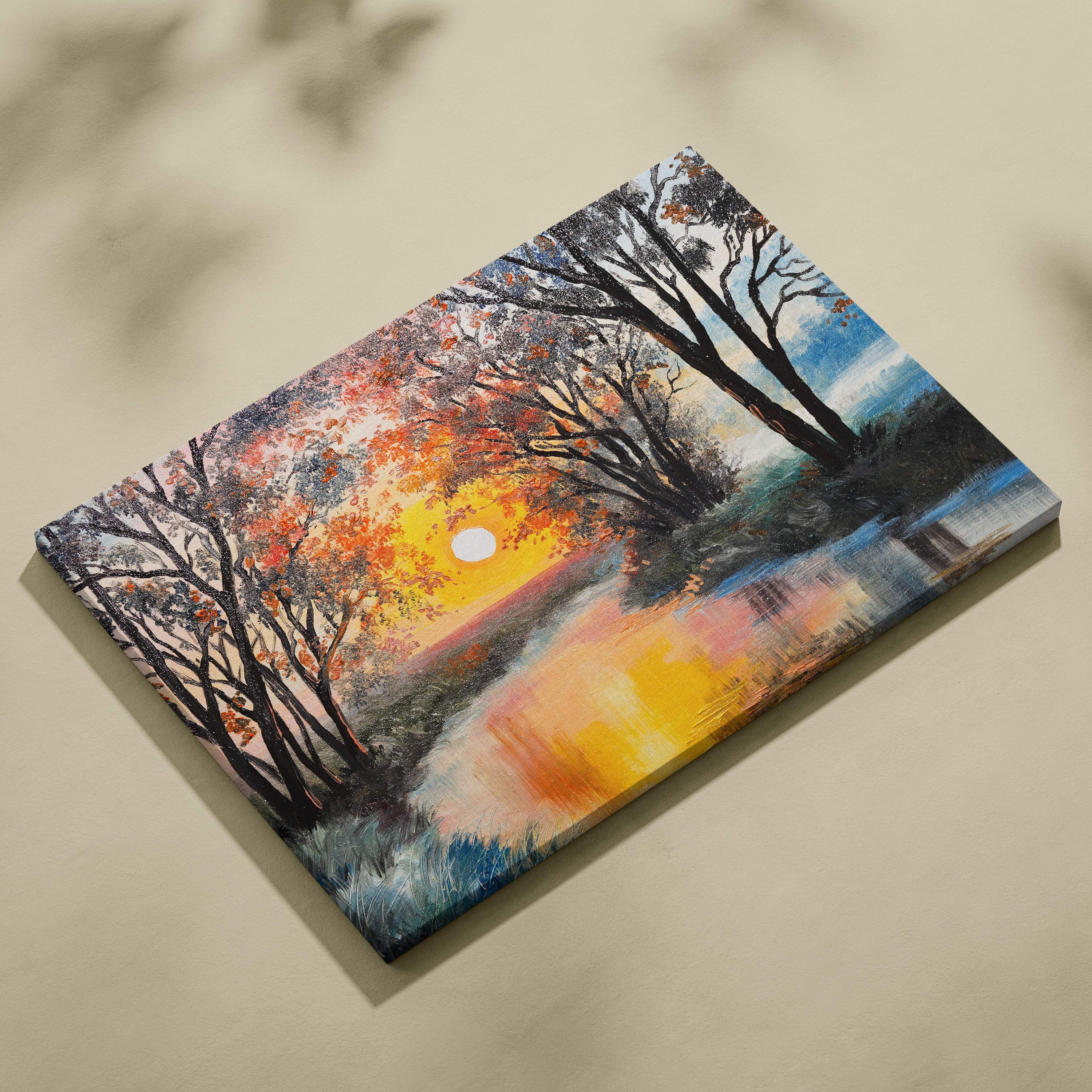 A vibrant autumn sunset river canvas wall art print with textured acrylic paint in orange and yellow hues over trees and water