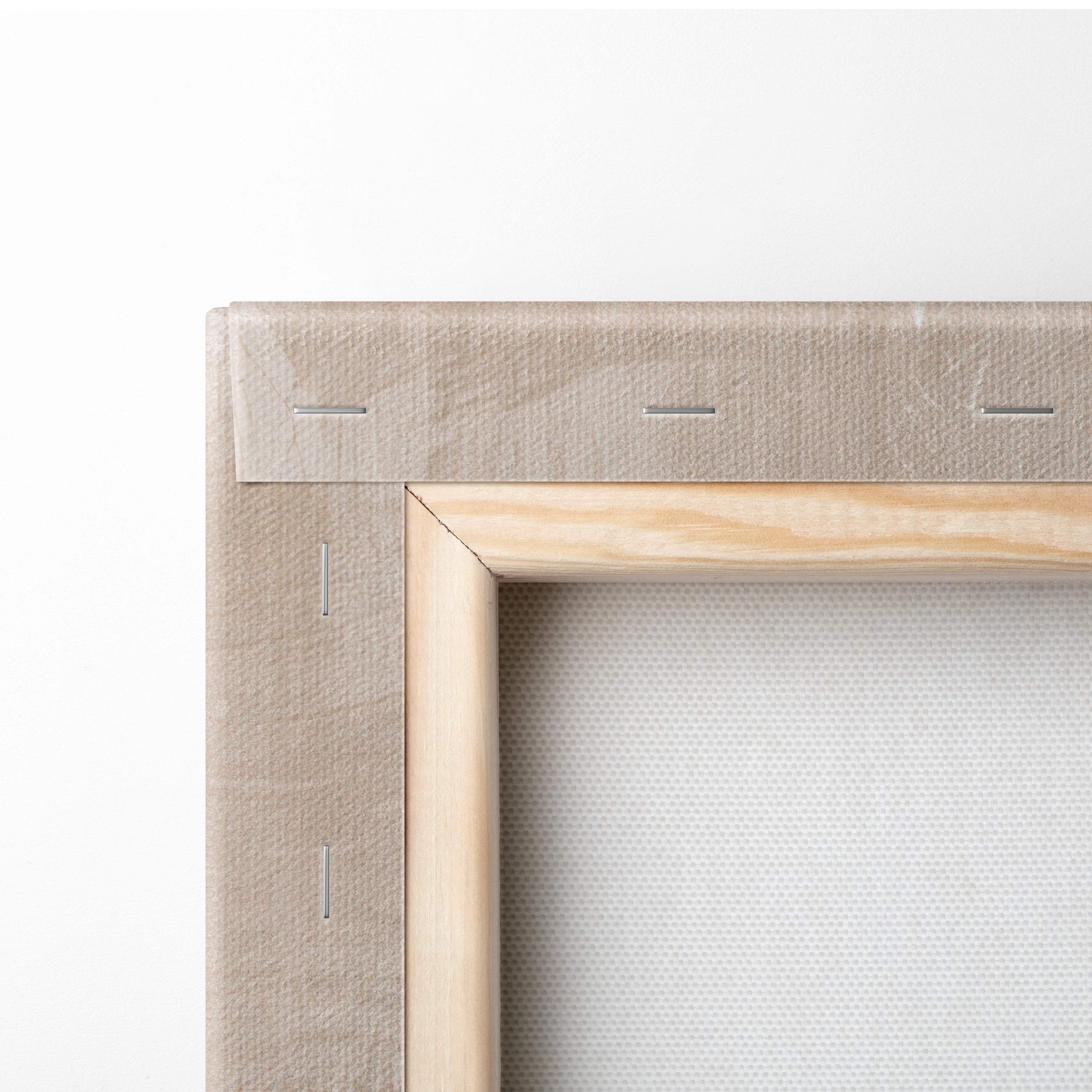 Light beige canvas stretched over natural wood frame with stitching for boho geometric balance wall art in earth tones