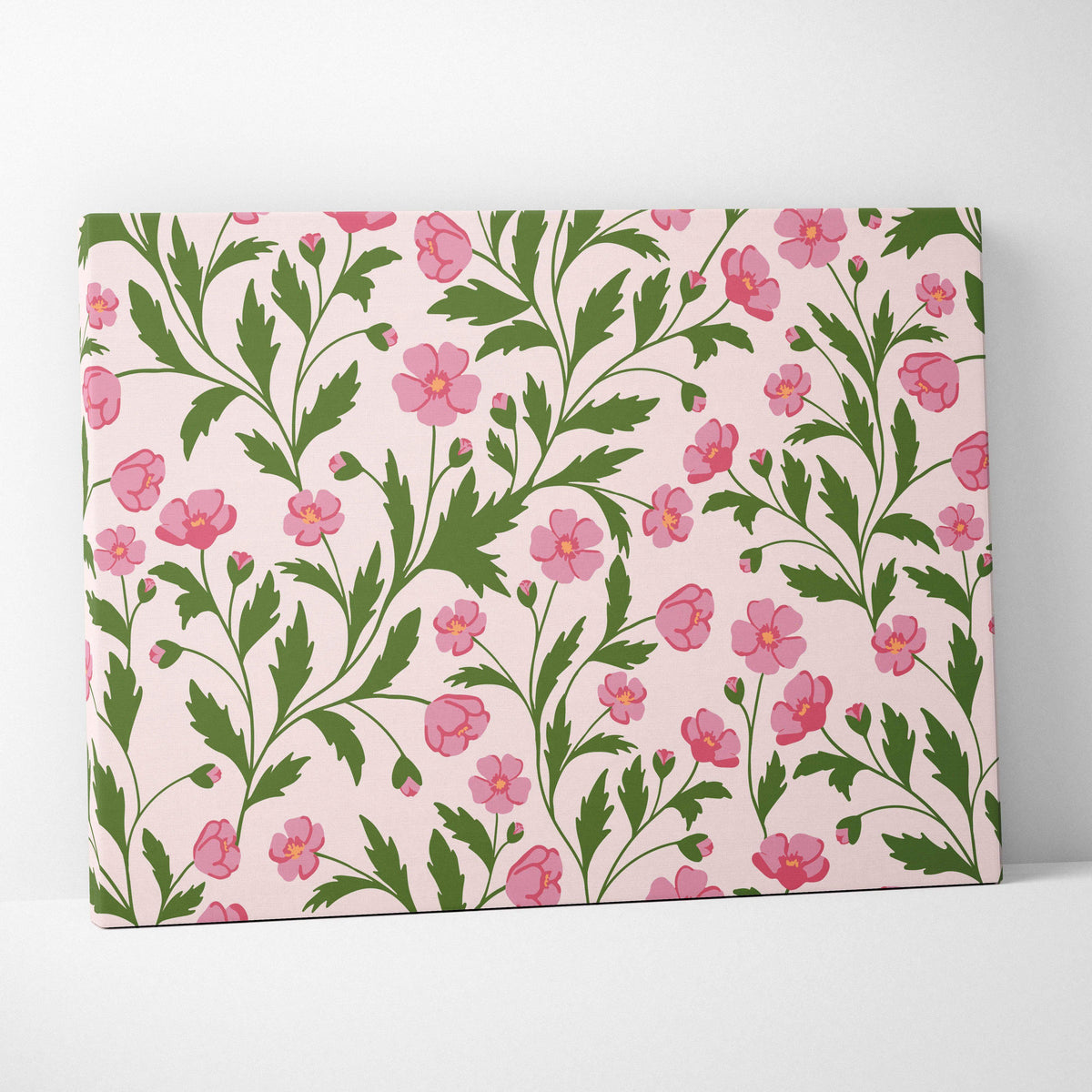 Seamless pink floral pattern canvas wall art with green leafy vines on soft blush background