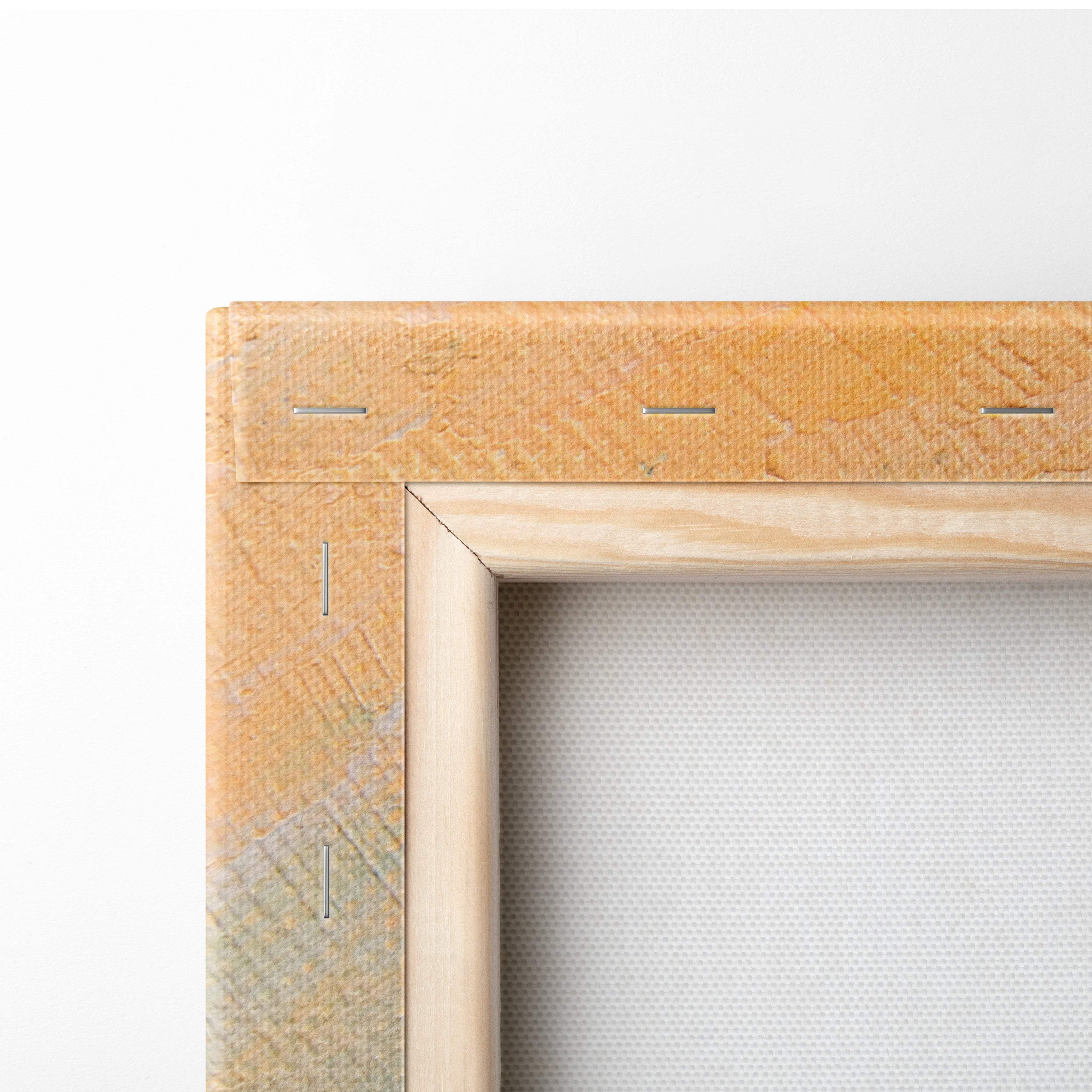 Light-colored wooden canvas frame with visible stitching on the back side of paris windmill canvas wall art print
