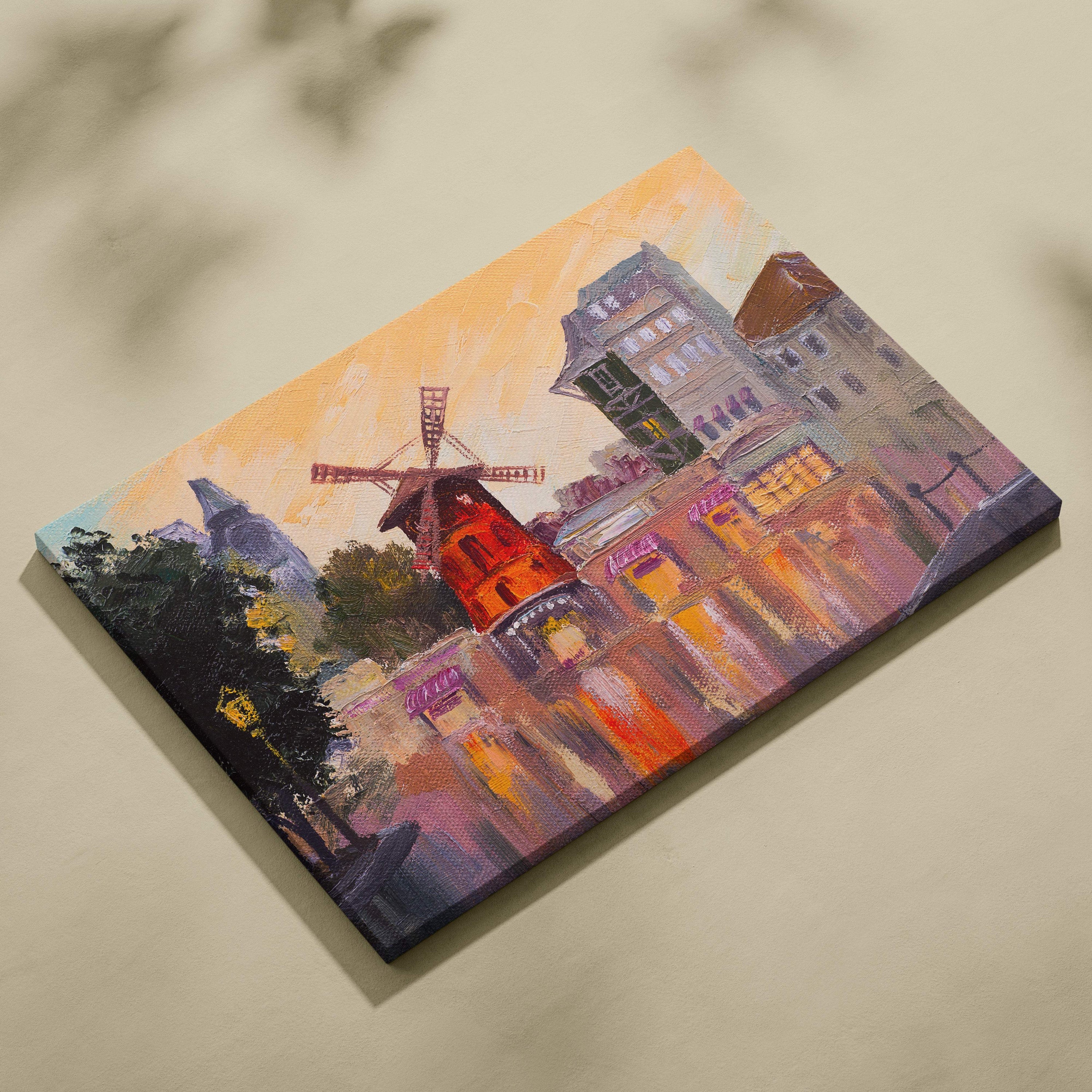 Vibrant paris windmill canvas wall art print featuring red windmill and european buildings under orange sky
