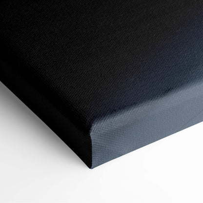Black canvas print with textured surface and raised edges featuring orange exotic supercar racing through light tunnel