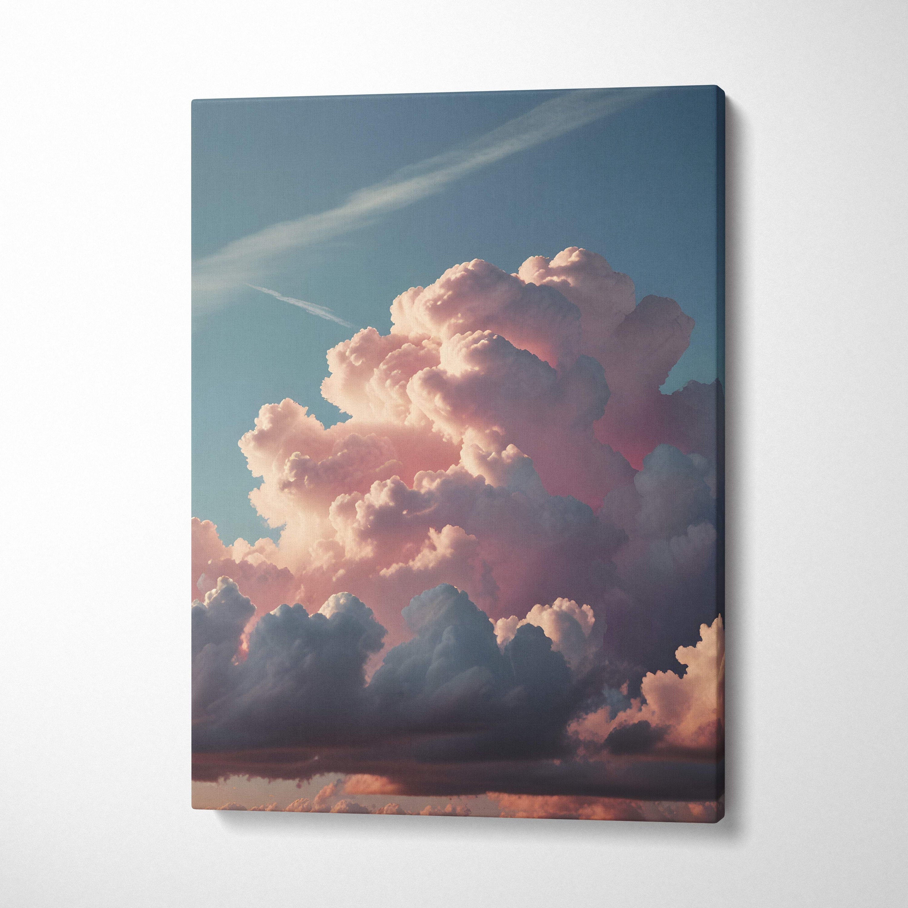 Rectangular canvas print of towering pink cumulonimbus clouds at sunset with soft pastel sky and dramatic cloudscape