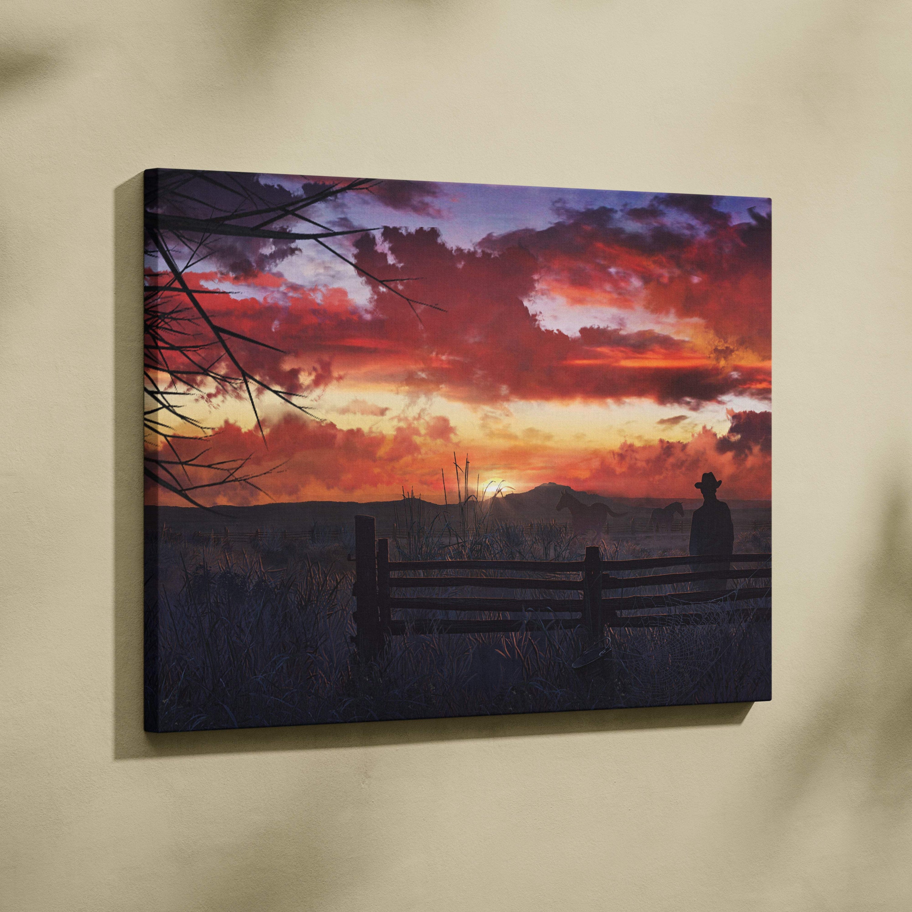 Western sunset canvas print featuring a vibrant red orange and purple sky with a cowboy silhouette by a wooden fence