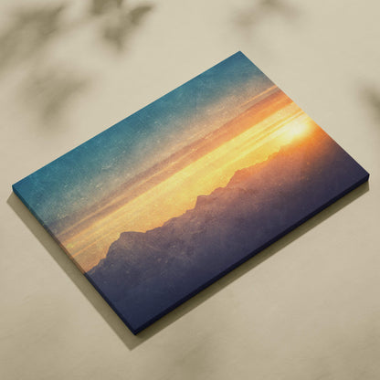 A rectangular canvas wall art print showing a golden mountain sunset with teal orange landscape for rustic decor
